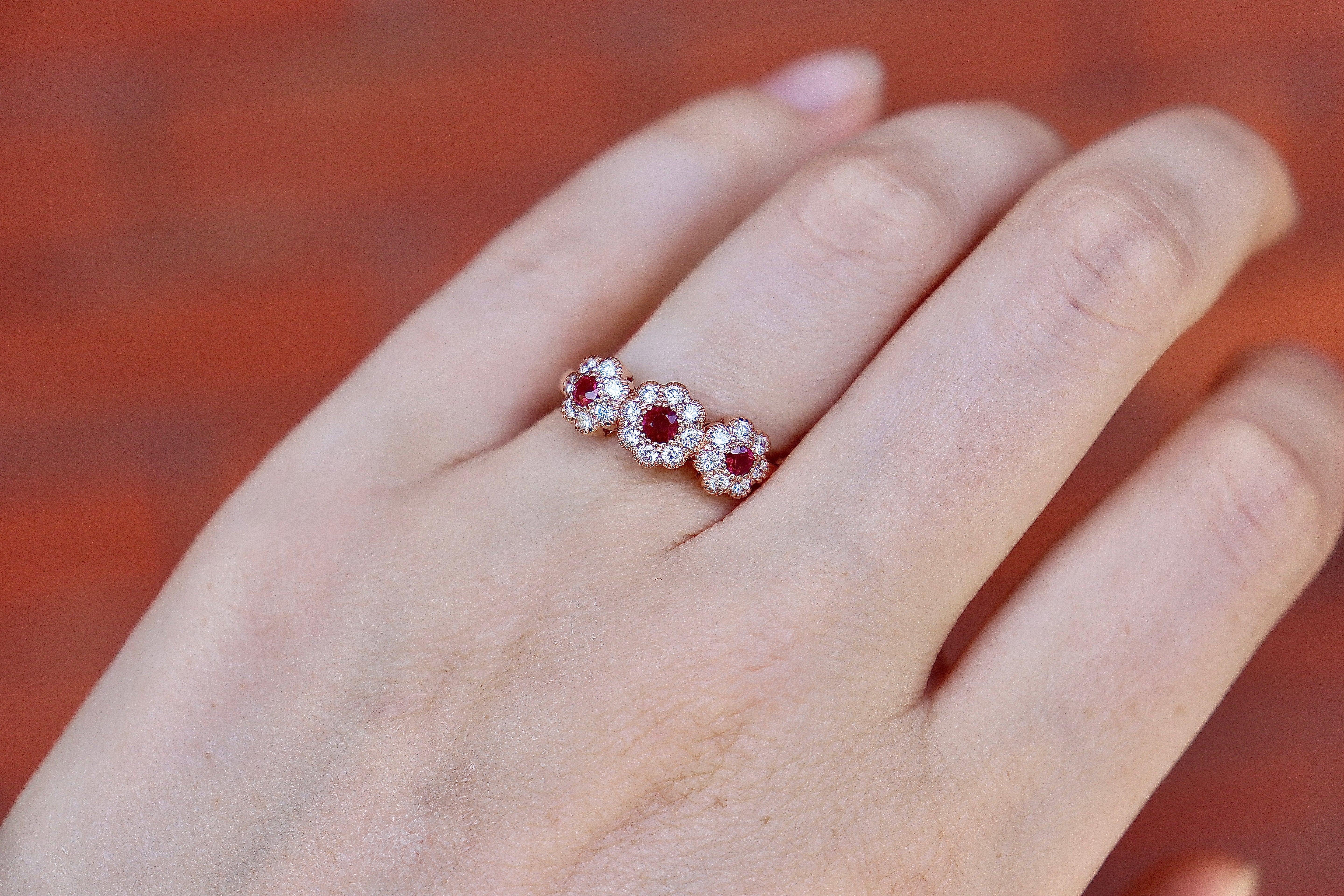 18ct Rose Gold Ruby and Diamond Triple Daisy Ring