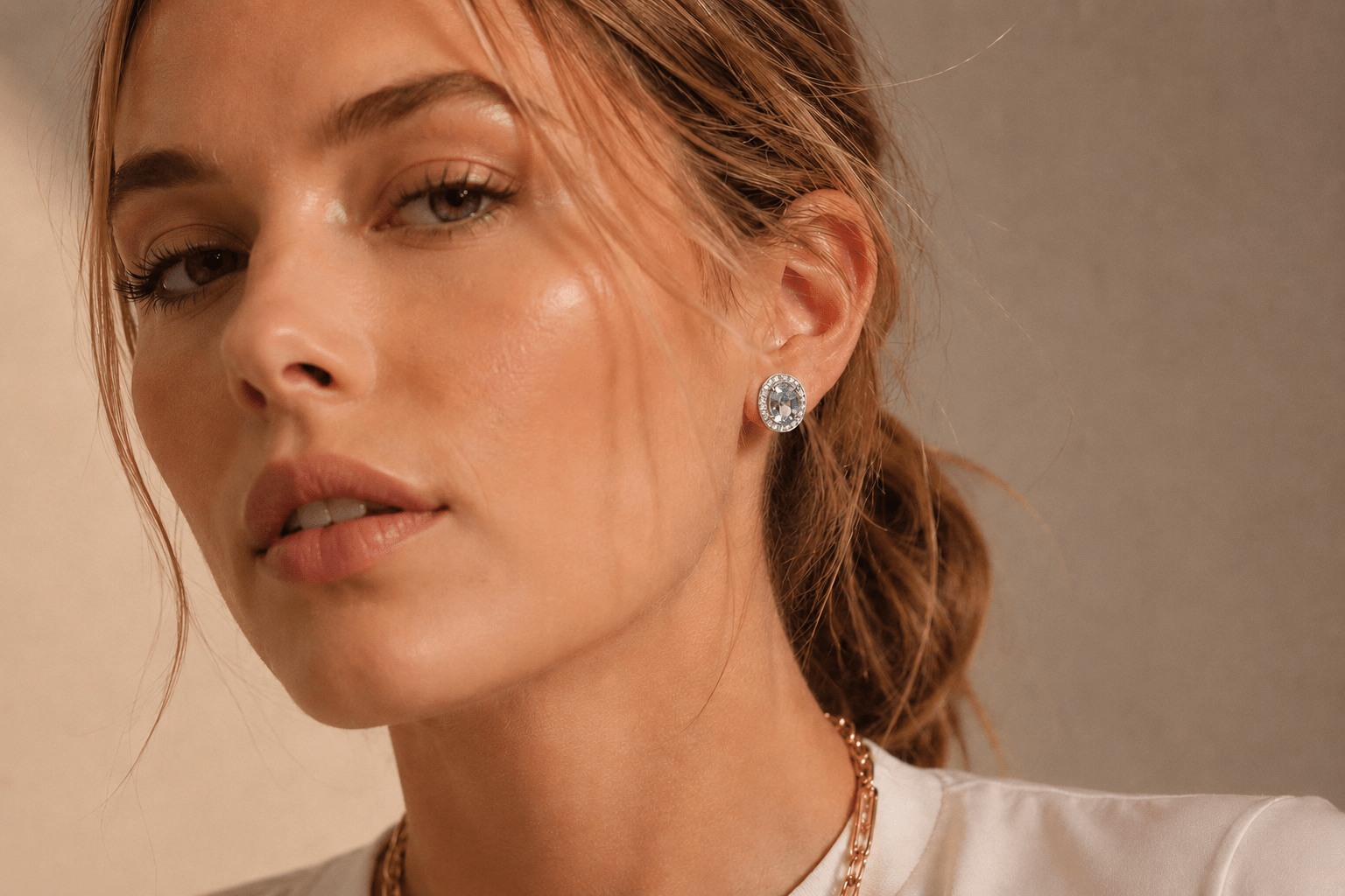 18ct White Gold Oval Aquamarine and Diamond Halo Stud Earrings - Burlington Jewellery