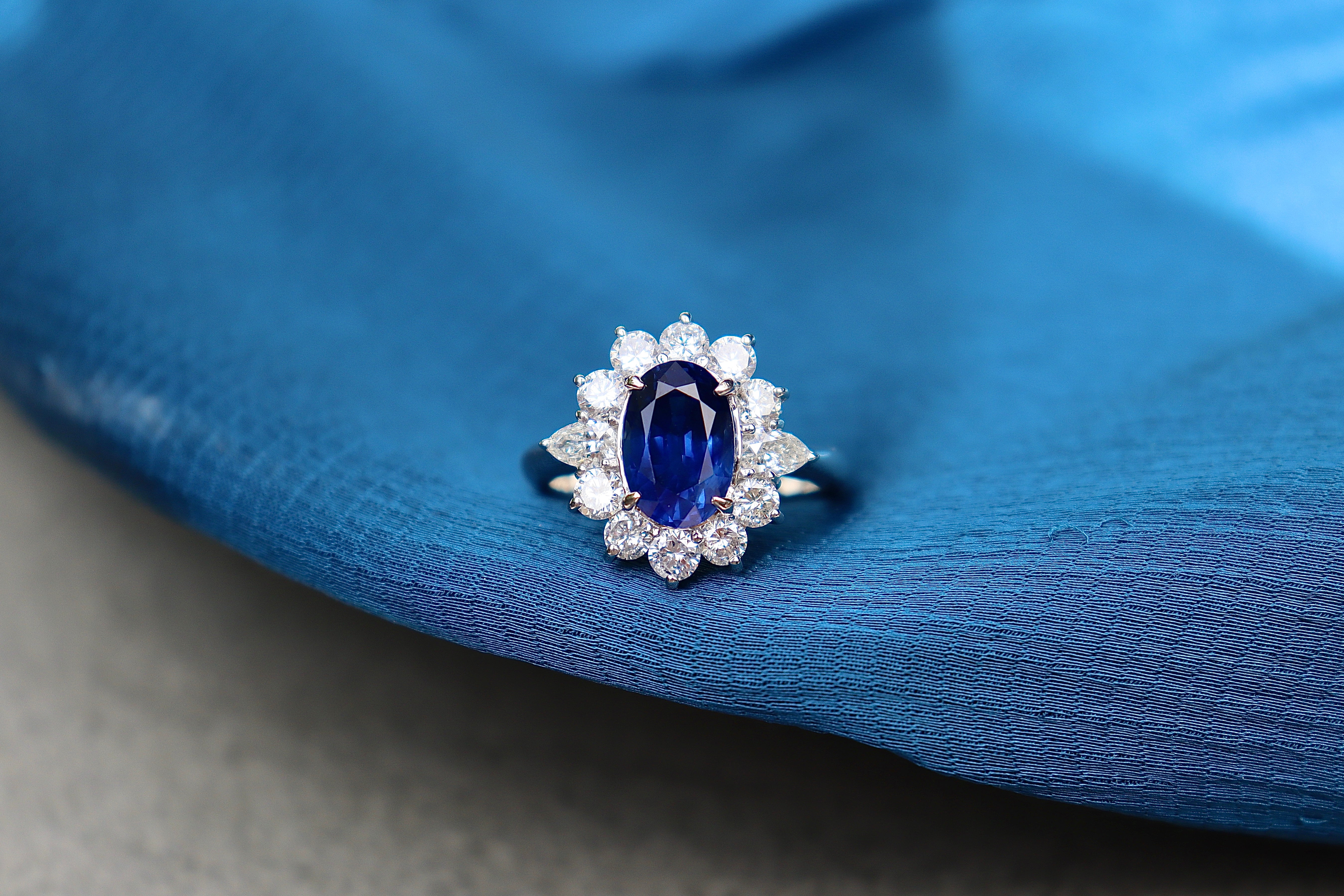 Platinum Oval Sapphire & Diamond Halo Cluster Ring