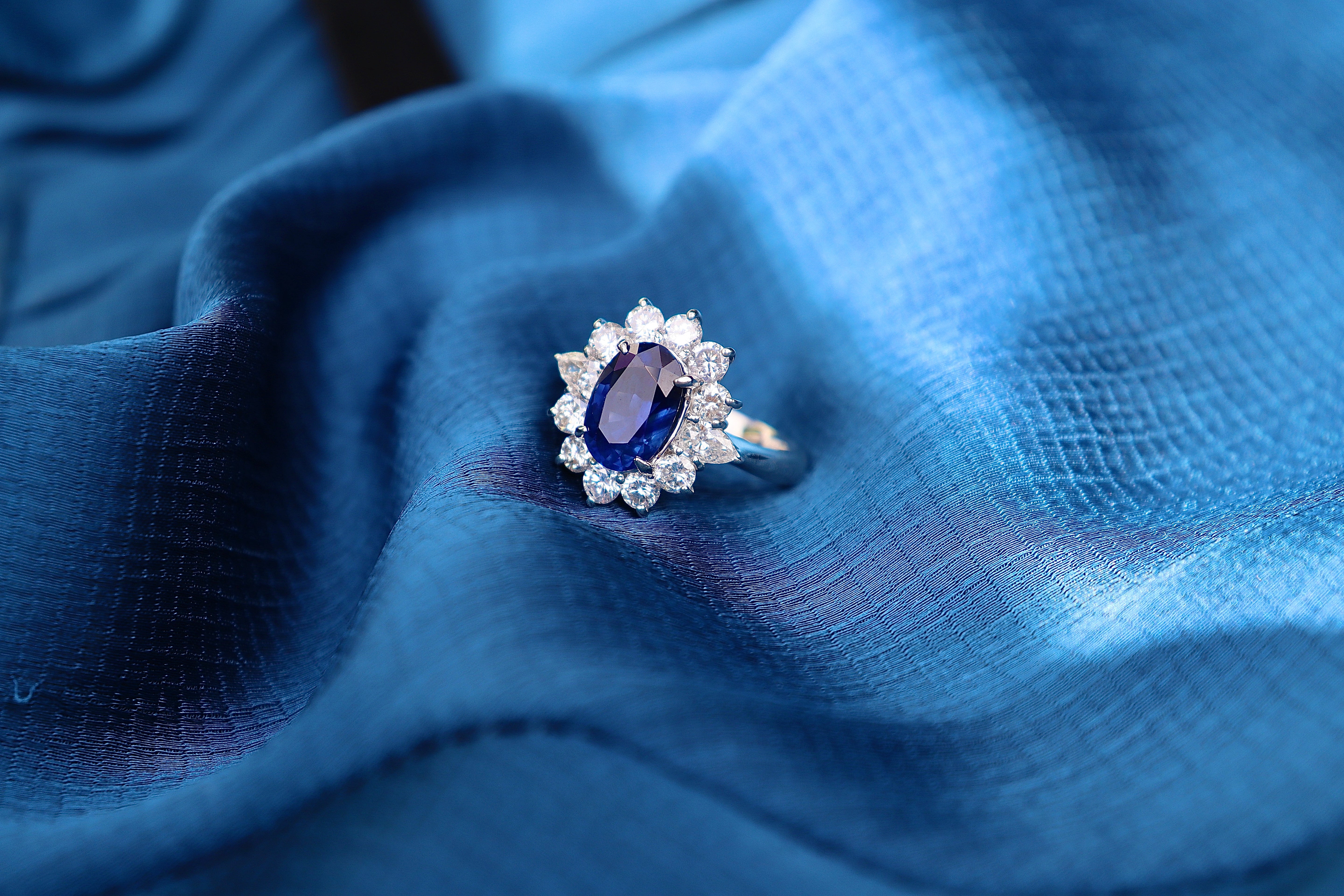 Platinum Oval Sapphire & Diamond Halo Cluster Ring