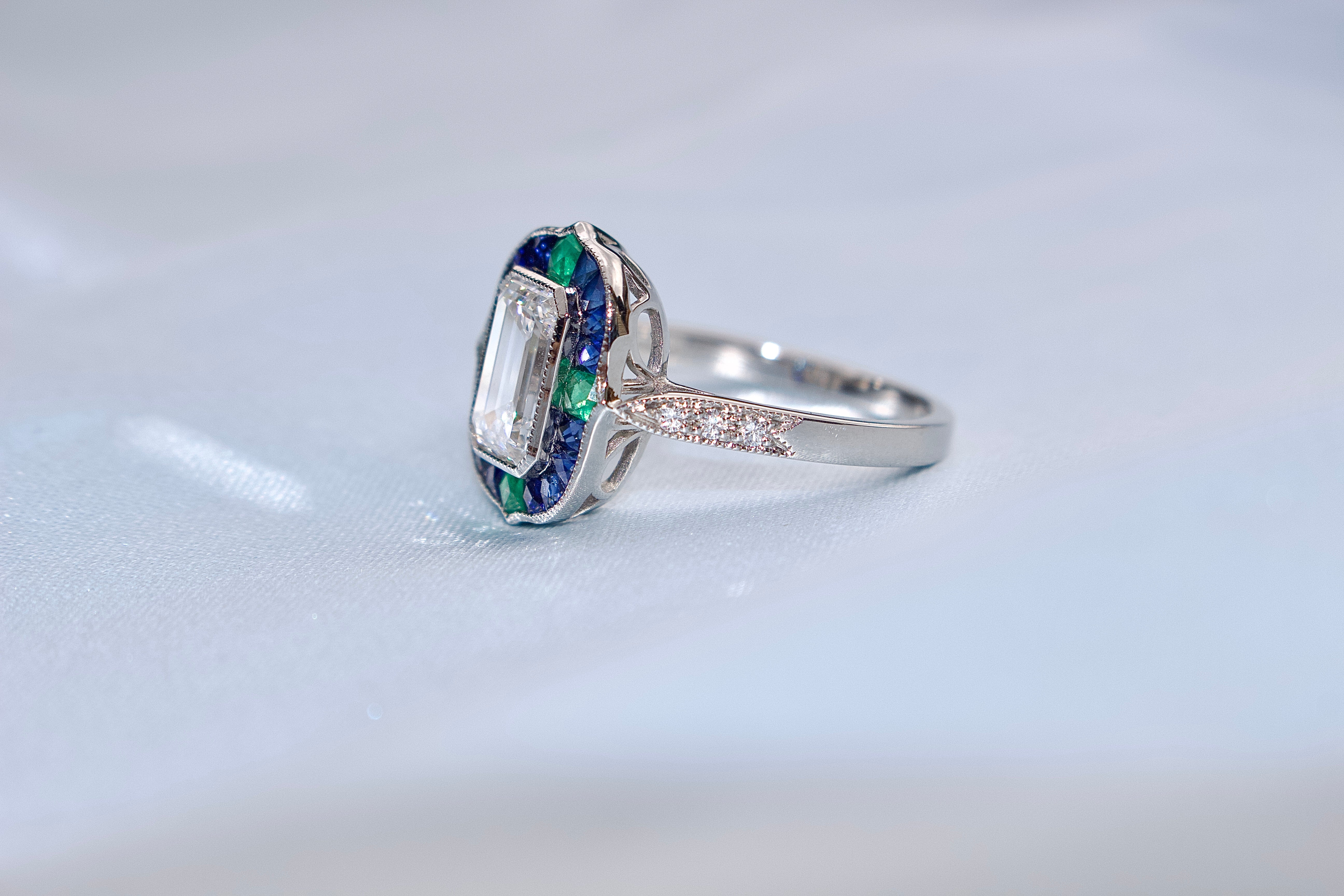 Platinum Lab Grown Emerald Cut Diamond and Sapphire and Emerald Art Deco Style Halo Ring