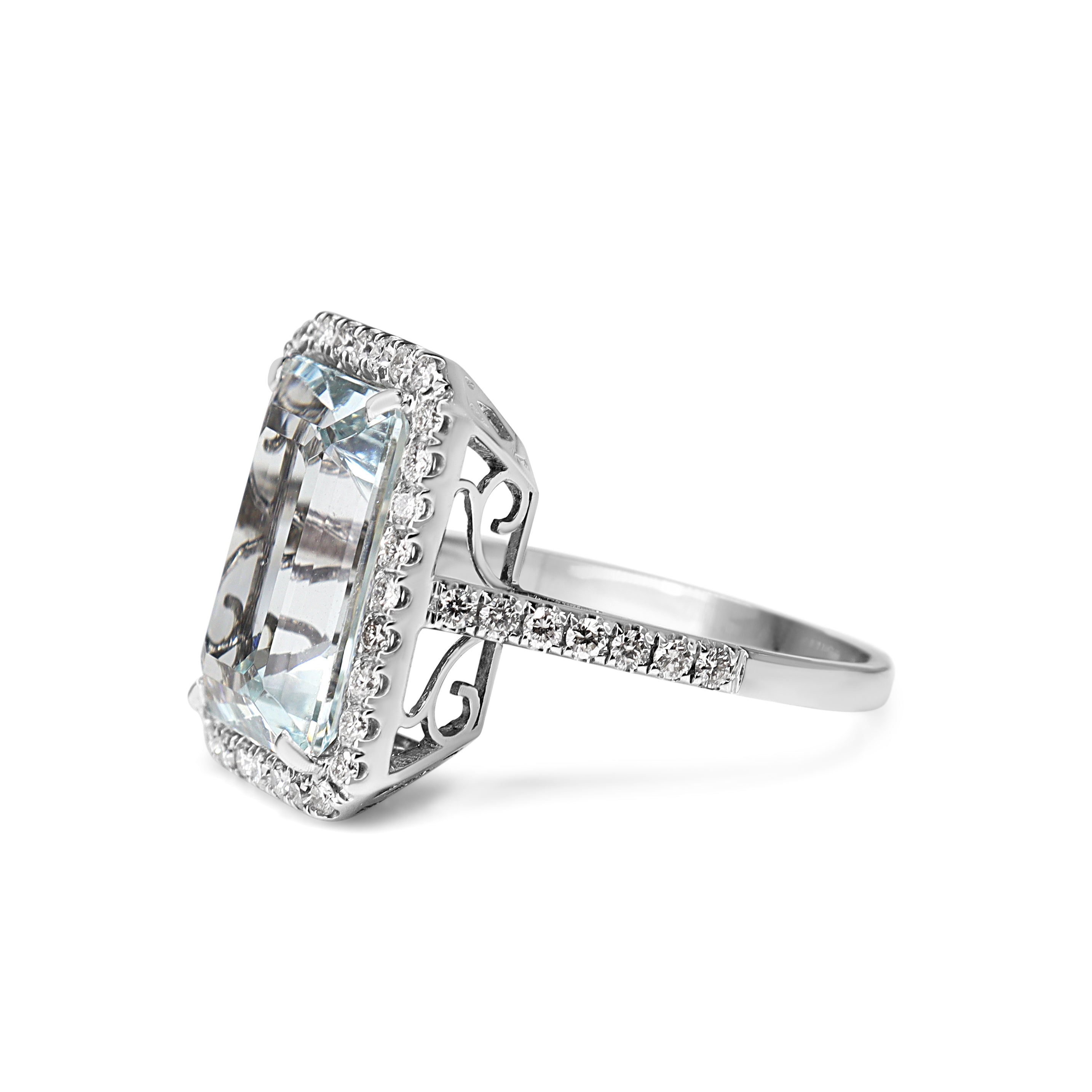18ct White Gold Emerald Cut Aquamarine and Diamond Halo Ring