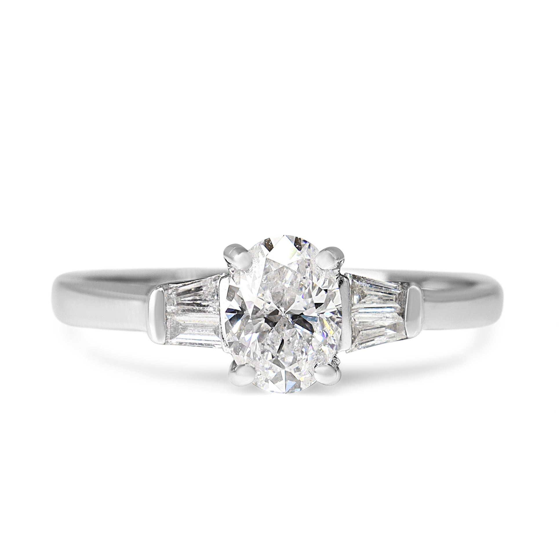 18ct White Gold Oval and Tapered Baguette Diamond Ring