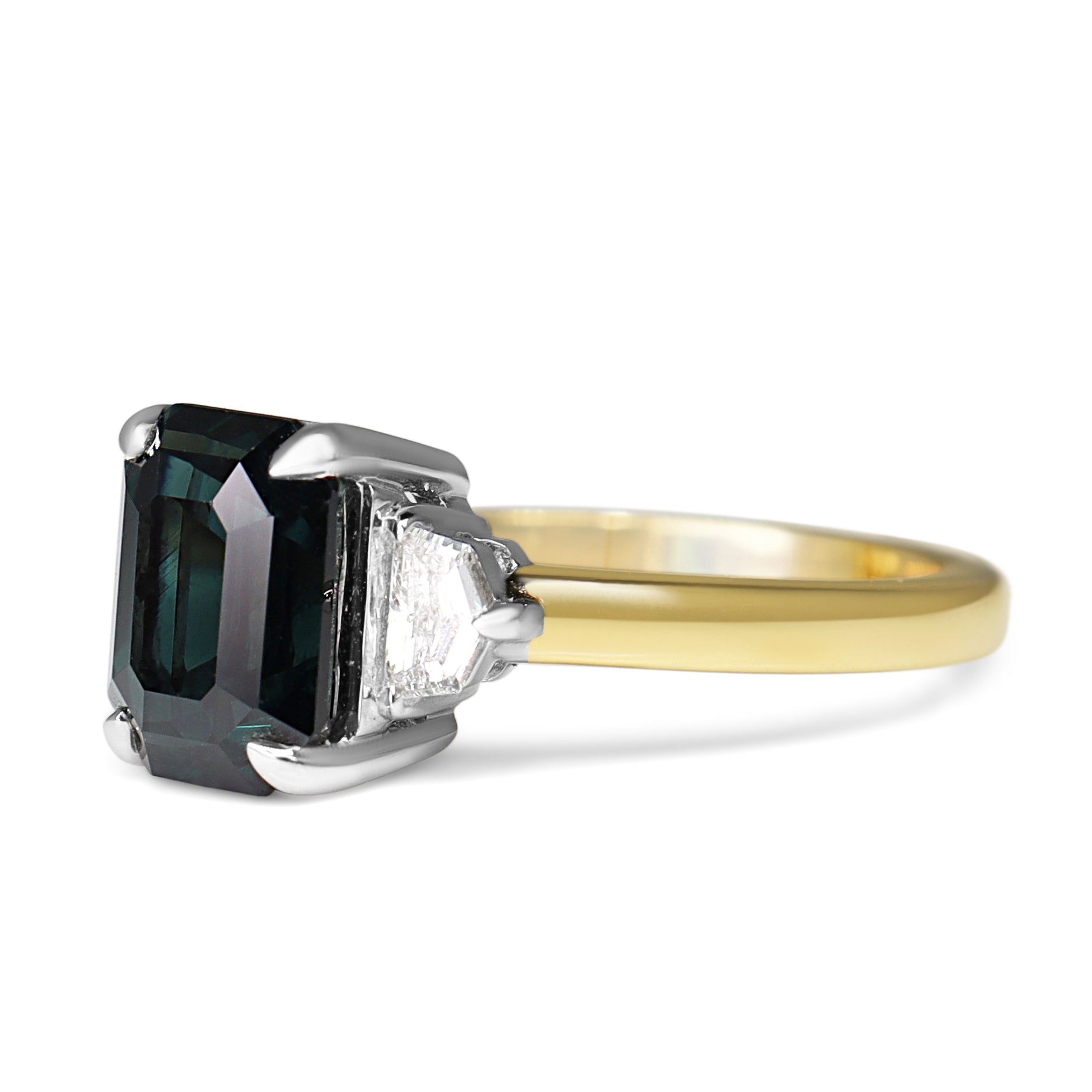 18ct Yellow and White Gold Emerald Cut Teal Sapphire and Cadillac Diamond 3 Stone Ring