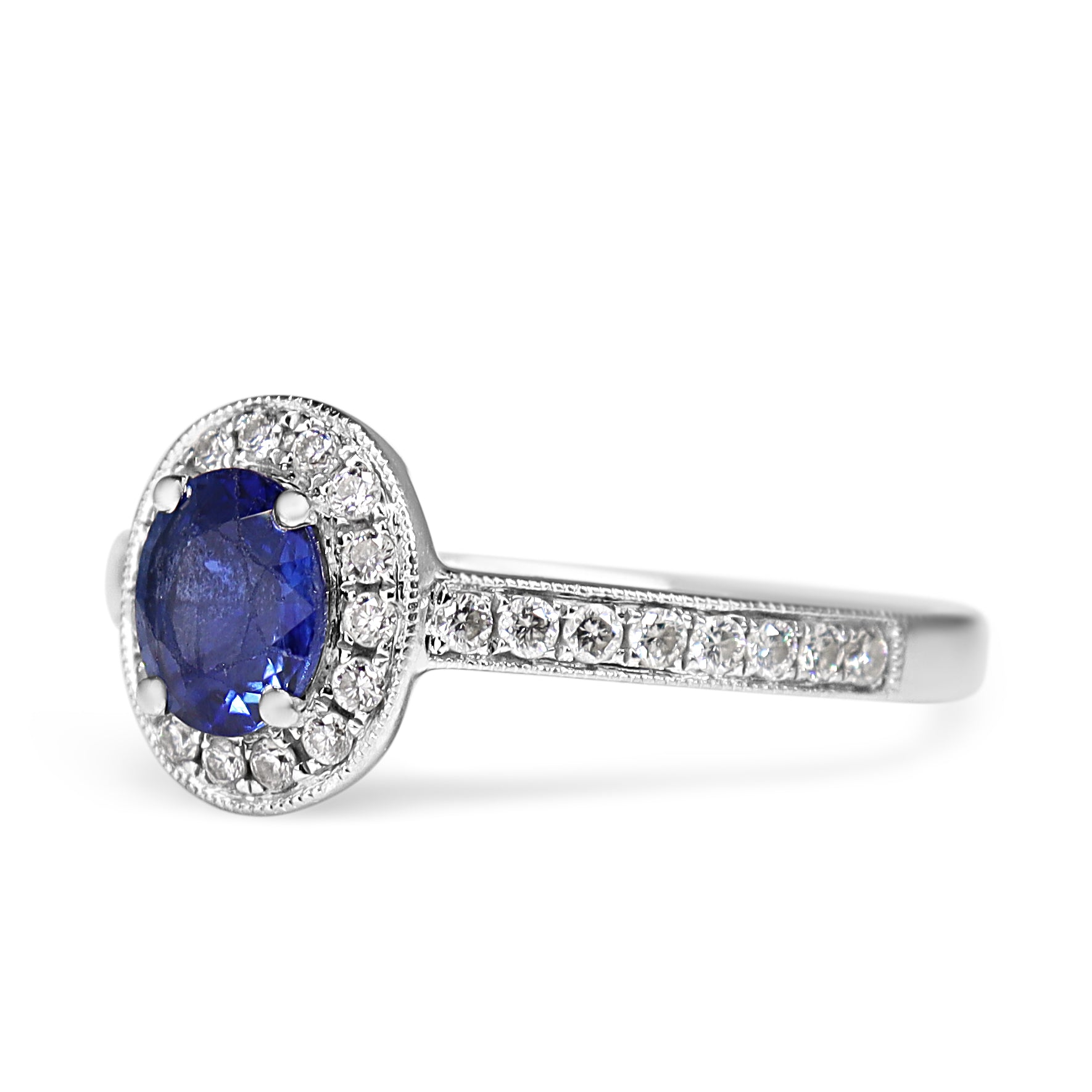 18ct White Gold Oval Sapphire and Diamond Halo Ring