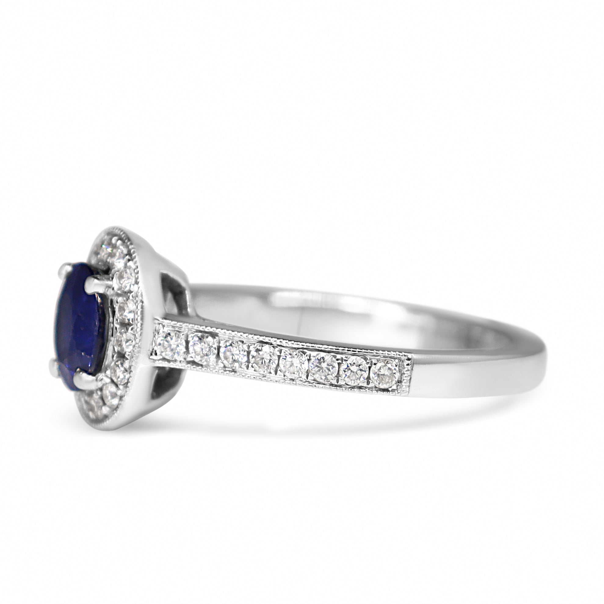 18ct White Gold Oval Sapphire and Diamond Halo Ring