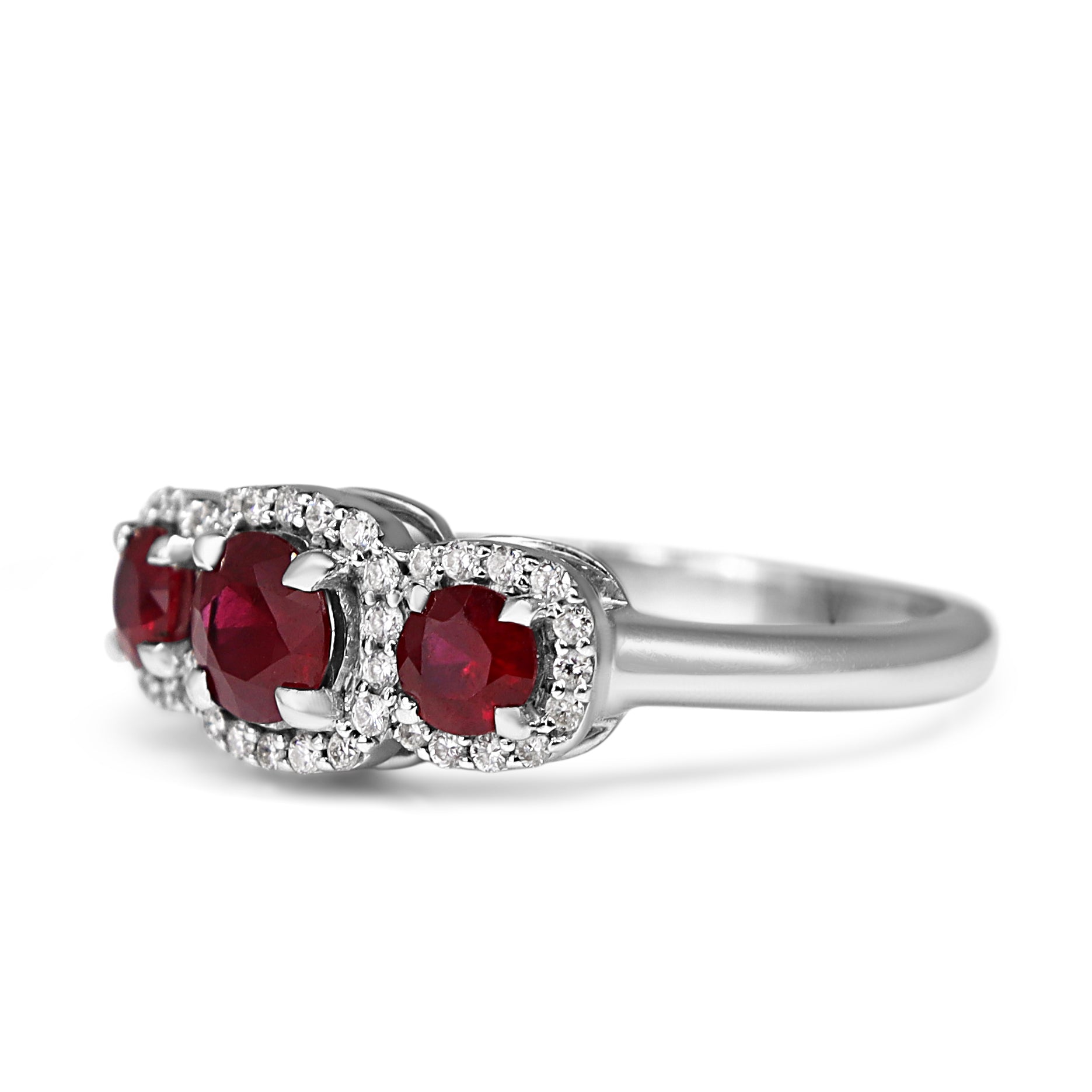 14ct White Gold Ruby 3 Stone and Diamond Halo Ring