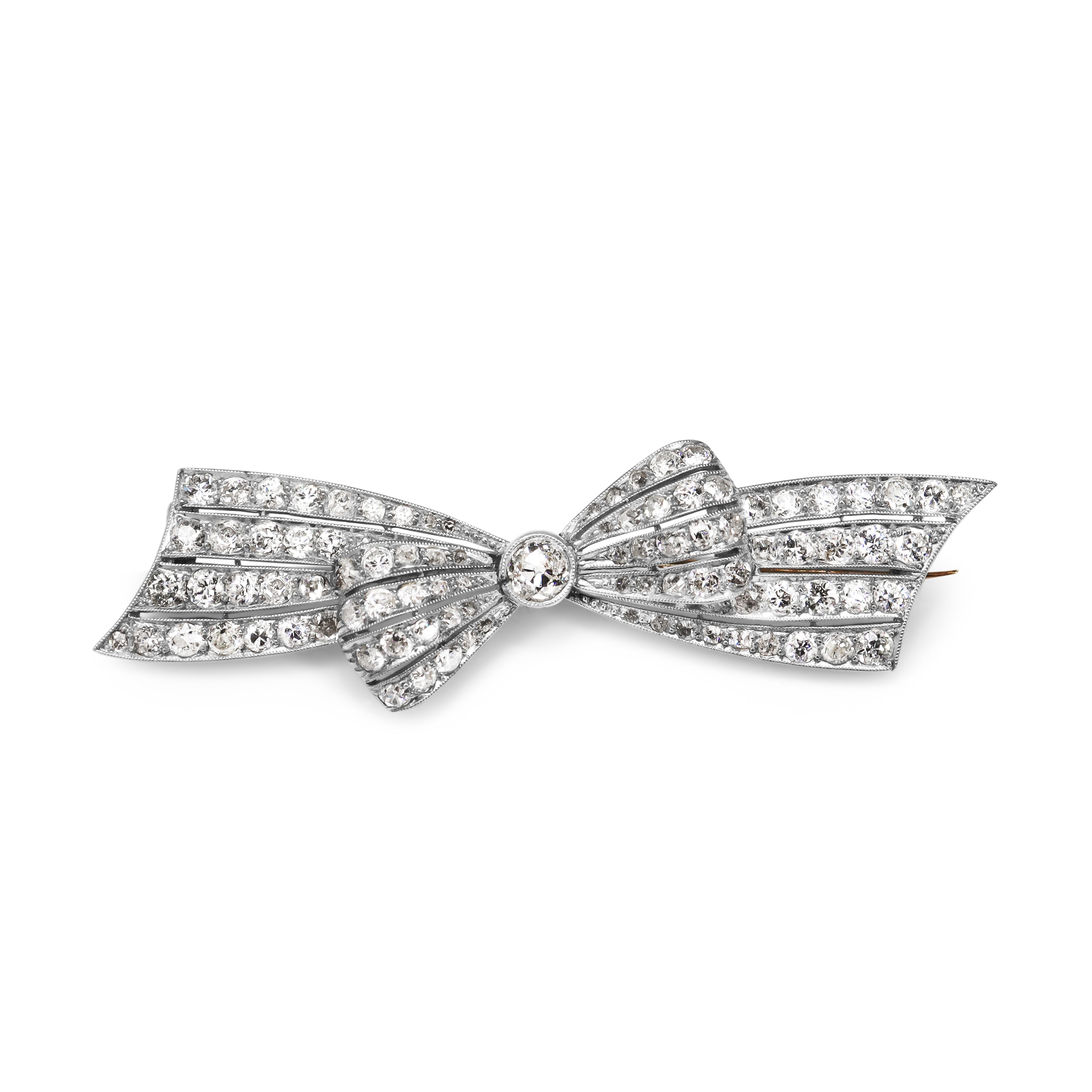Platinum and 14ct Yellow Gold Art Deco Old Cut Diamond Bow Brooch