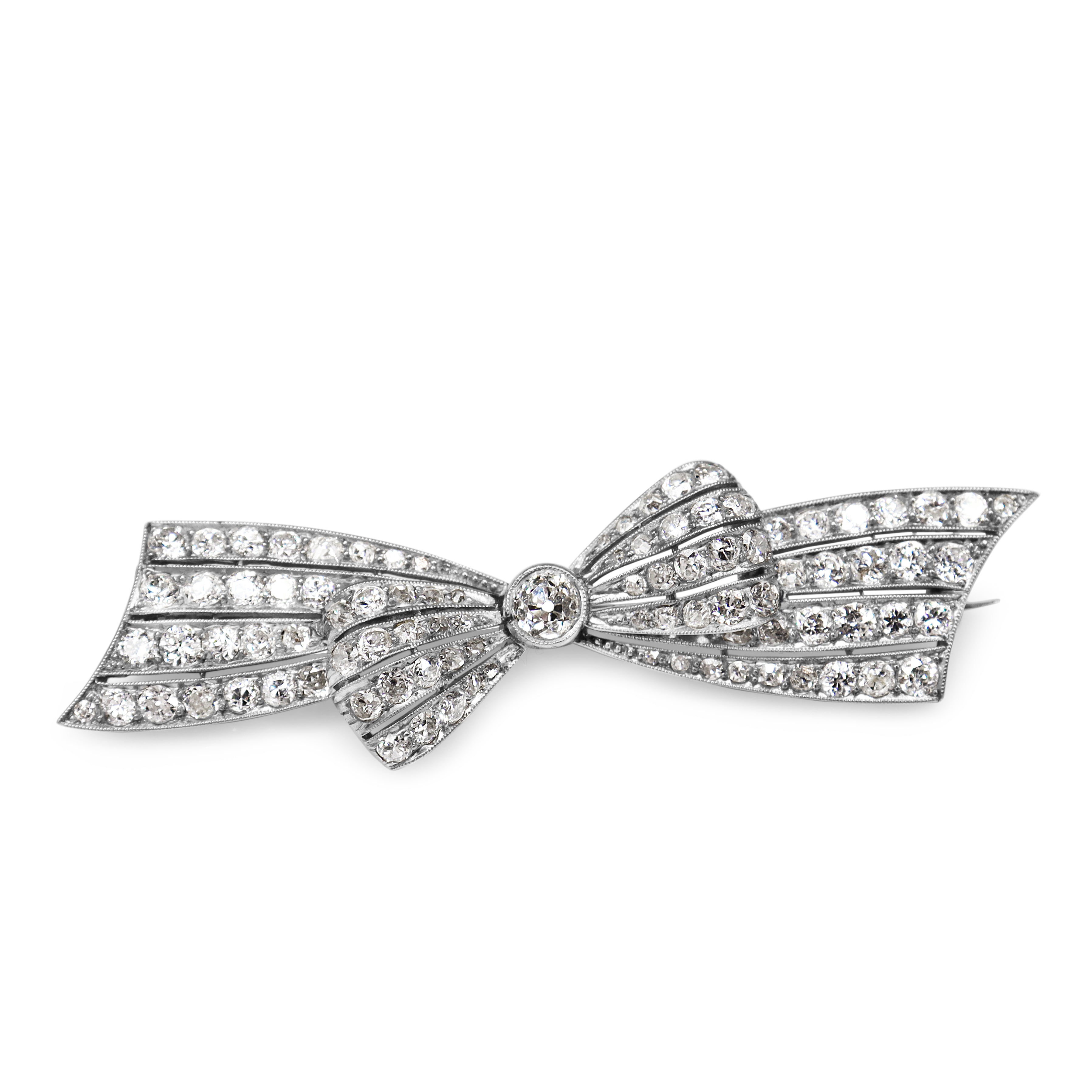 Platinum and 14ct Yellow Gold Art Deco Old Cut Diamond Bow Brooch