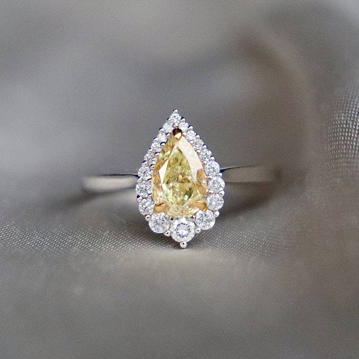 18ct White Gold Yellow Pear Diamond and Graduated Halo Ring
