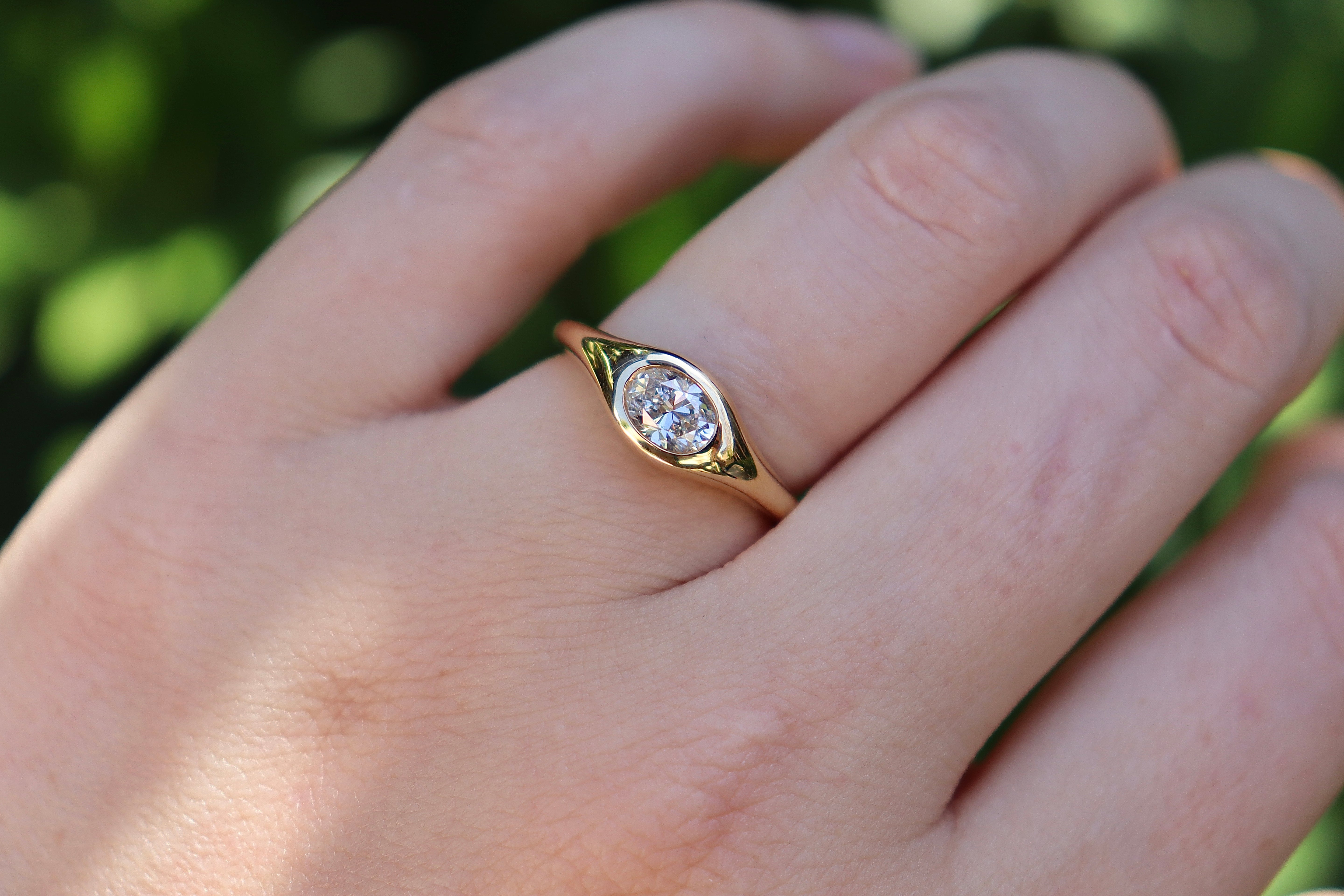 18ct Yellow Gold Oval East West Bezel Diamond Ring