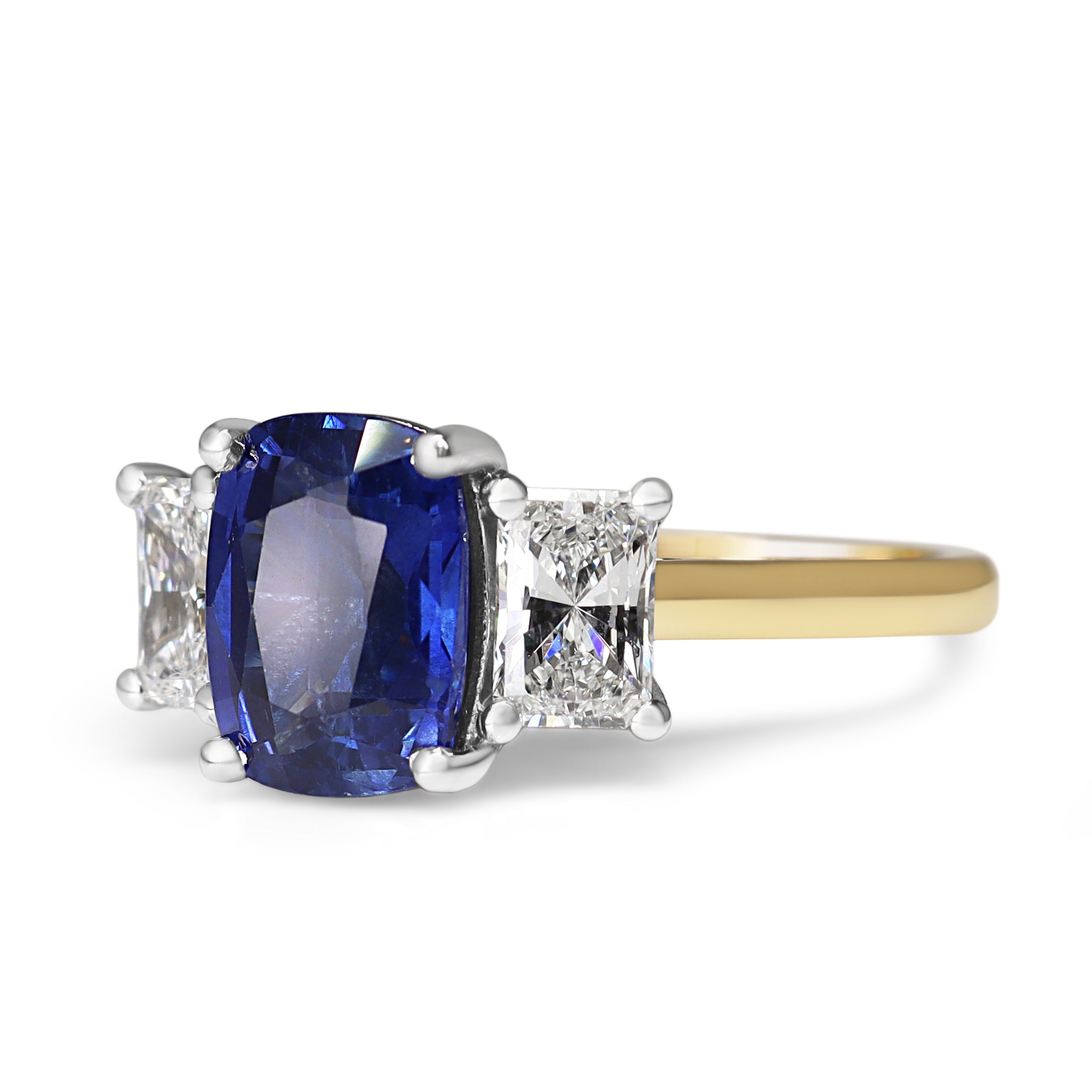 18ct Yellow and White Gold Cushion Sapphire and Radiant Cut Diamond 3 Stone Ring
