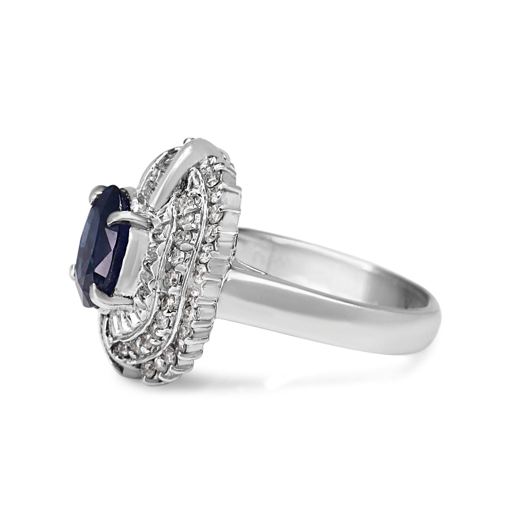 Platinum Sapphire and Round and Baguette Cluster Diamond Ring