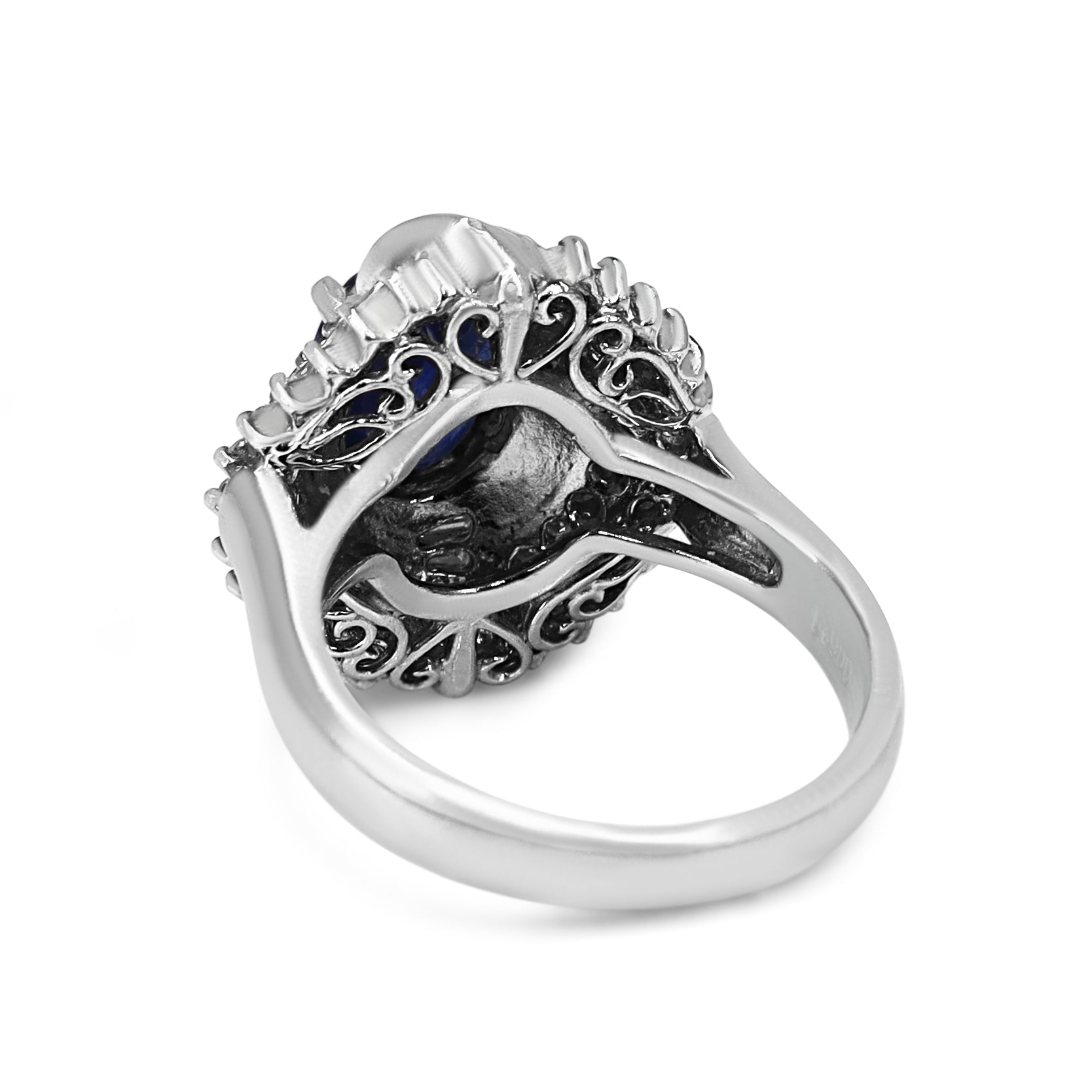 Platinum Sapphire and Round and Baguette Cluster Diamond Ring