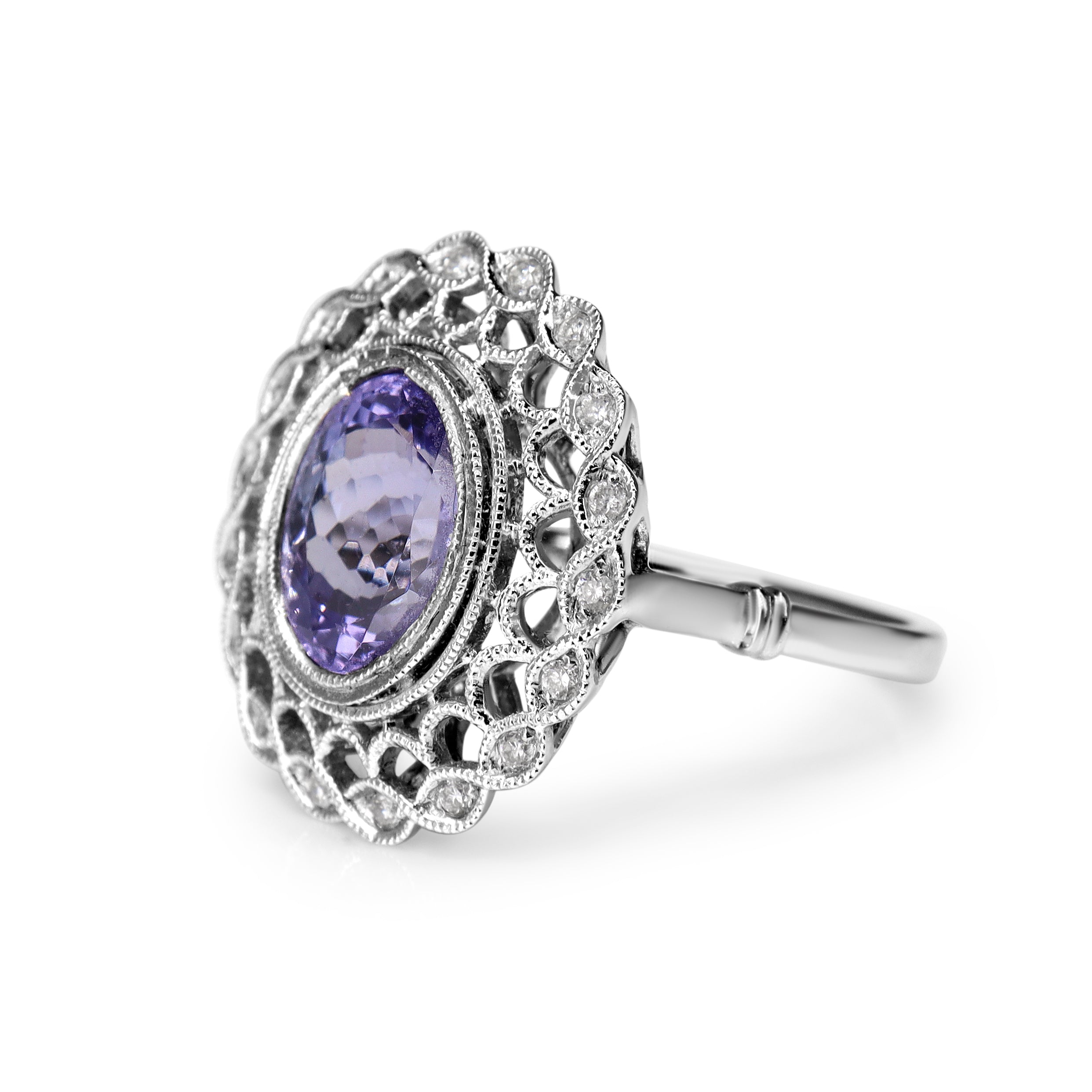 18ct White Gold Tanzanite and Diamond Fancy Halo Ring