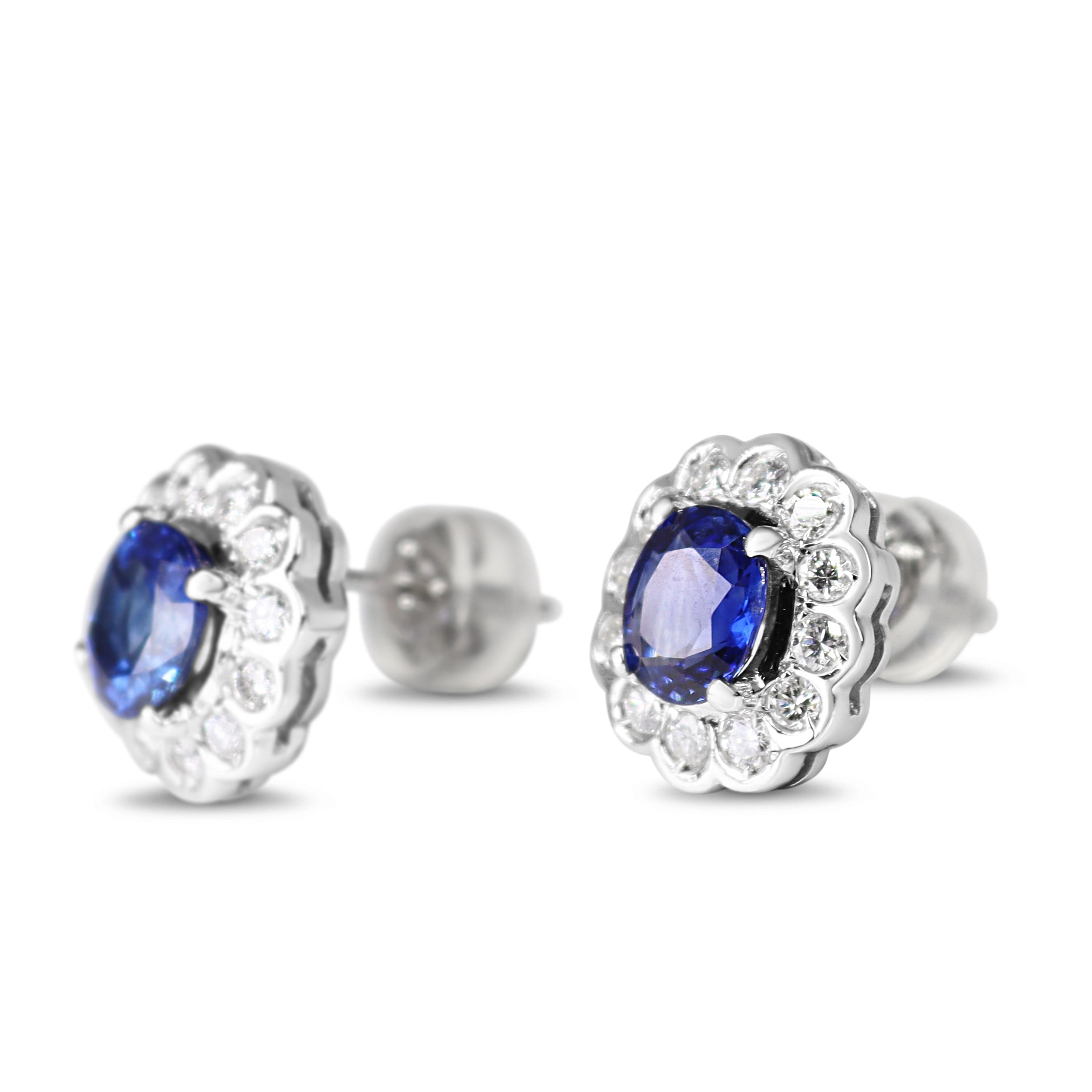 Platinum Oval Sapphire and Diamond Daisy Halo Earrings