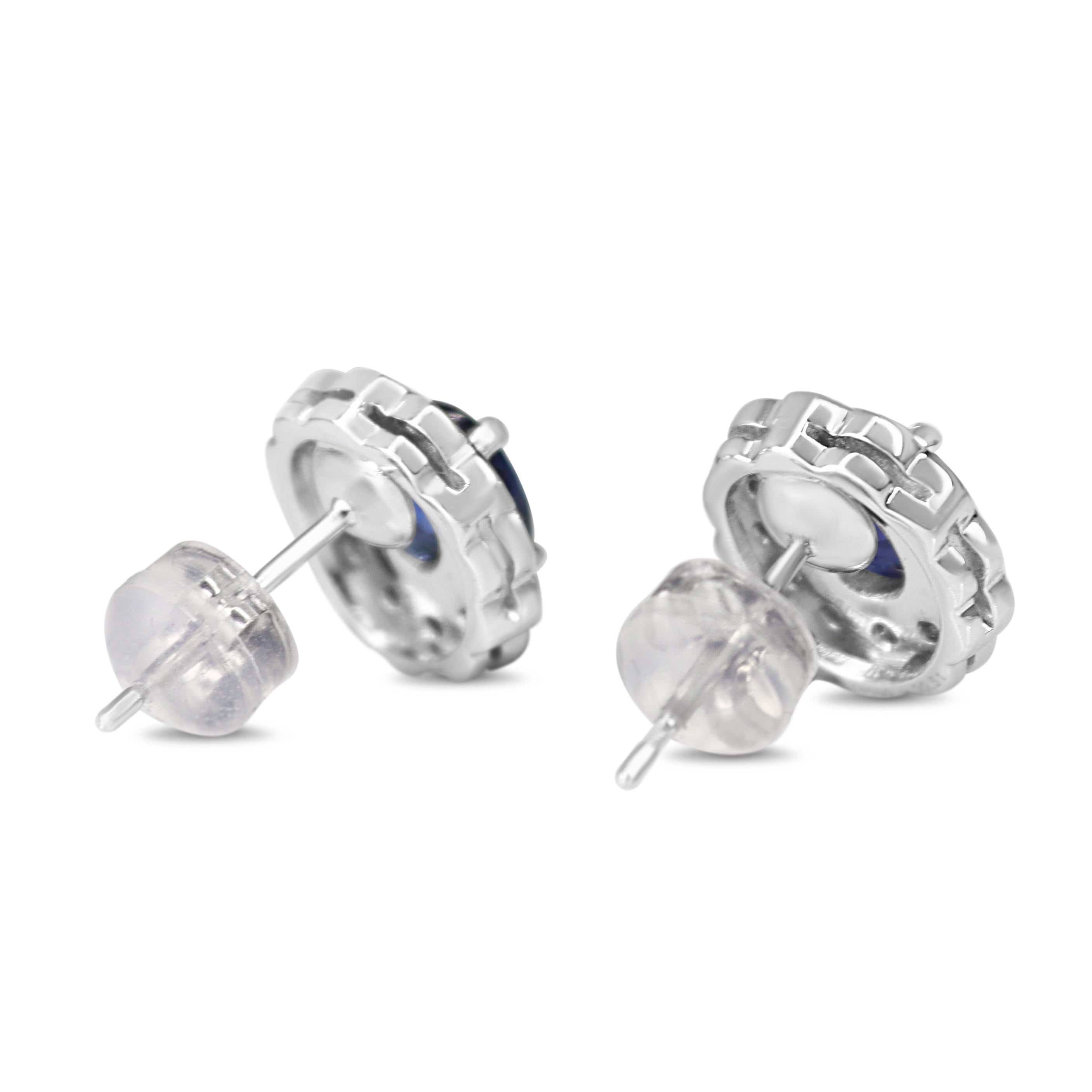 Platinum Oval Sapphire and Diamond Daisy Halo Earrings