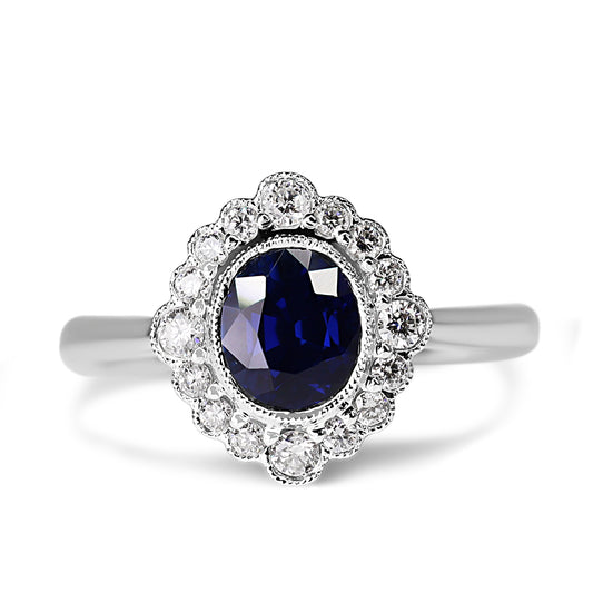 18ct White Gold Sapphire and Diamond Daisy Style Halo Ring