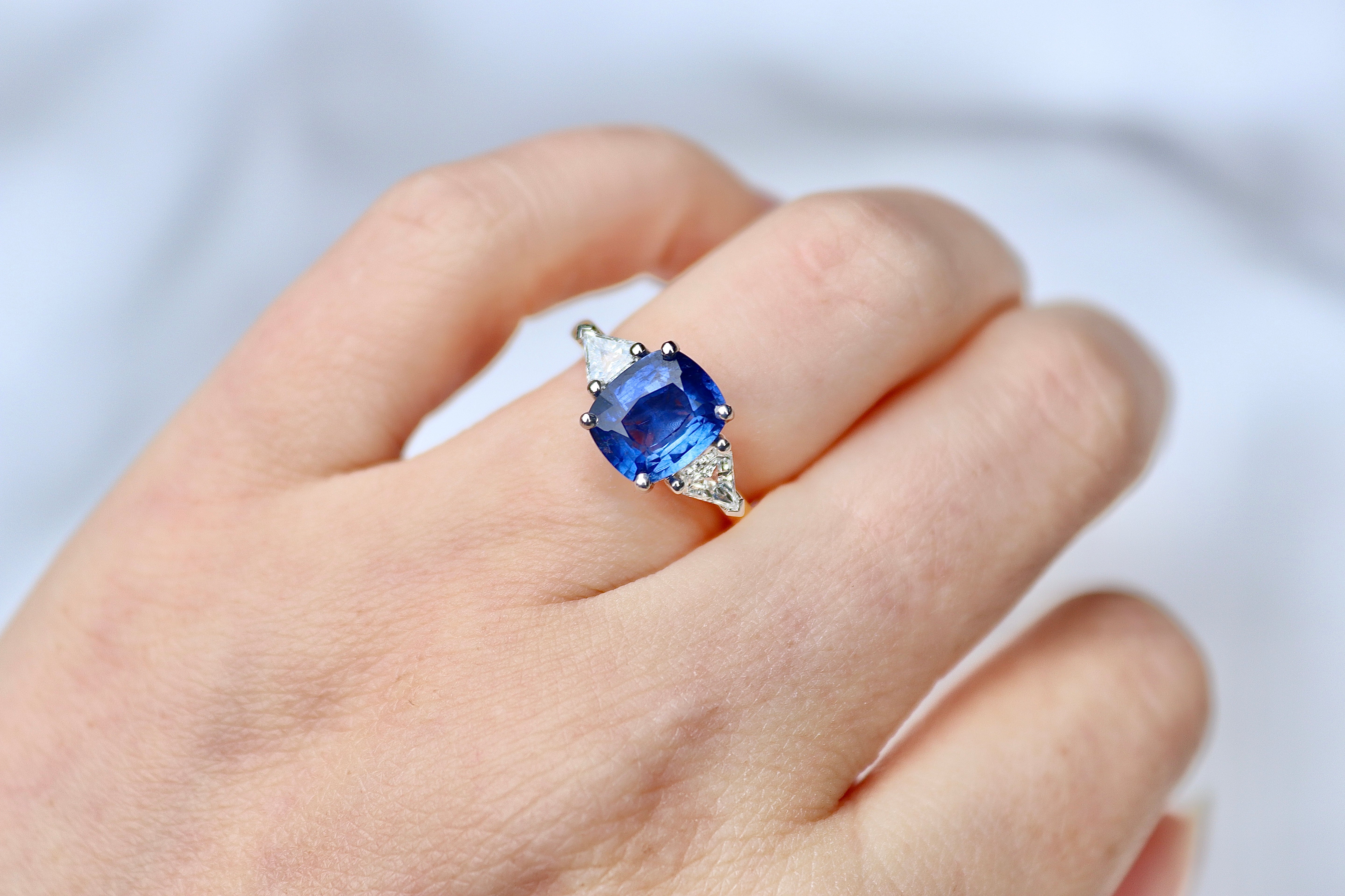 18ct Yellow and White Gold Cushion Sapphire and Trillion Diamond 3 Stone Ring