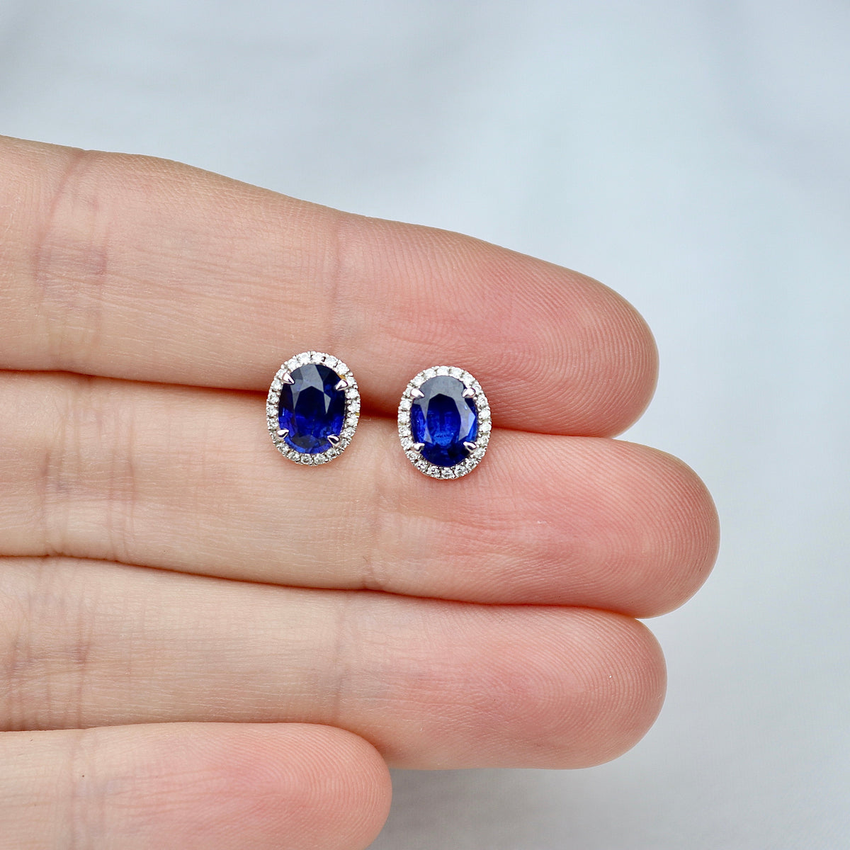 18ct White Gold Sapphire and Diamond Oval Halo Stud Earrings