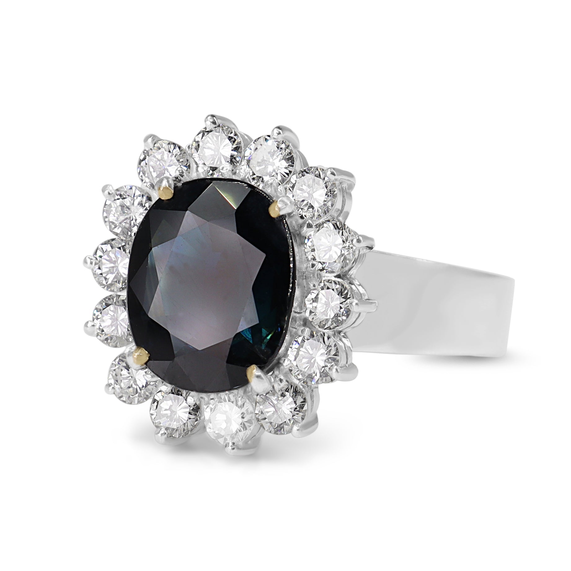 18ct White Gold Sapphire and Diamond Halo Cluster Ring