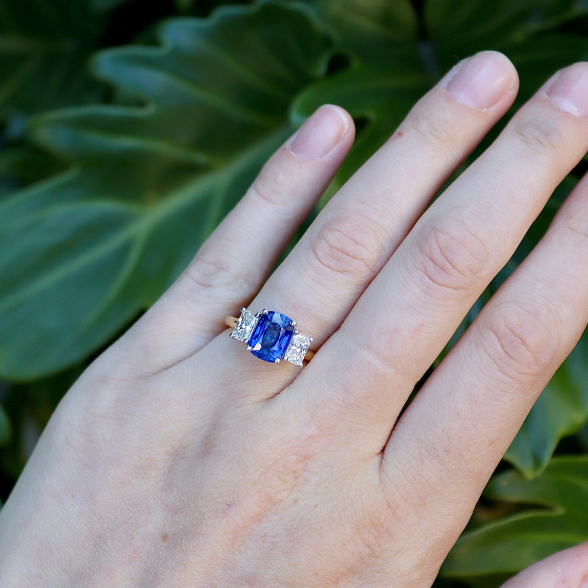 18ct Yellow and White Gold Cushion Sapphire and Radiant Cut Diamond 3 Stone Ring
