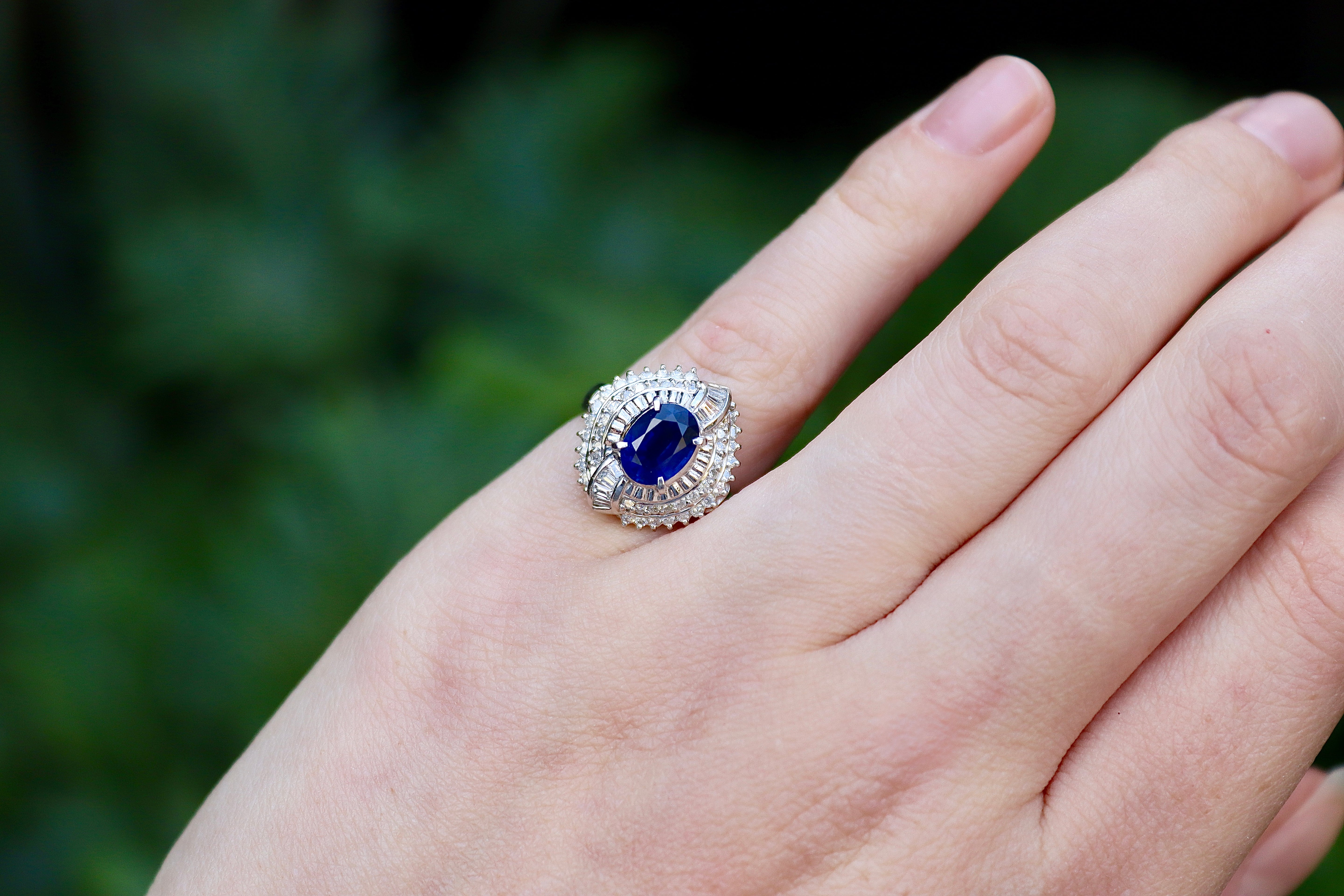 Platinum Sapphire and Round and Baguette Cluster Diamond Ring