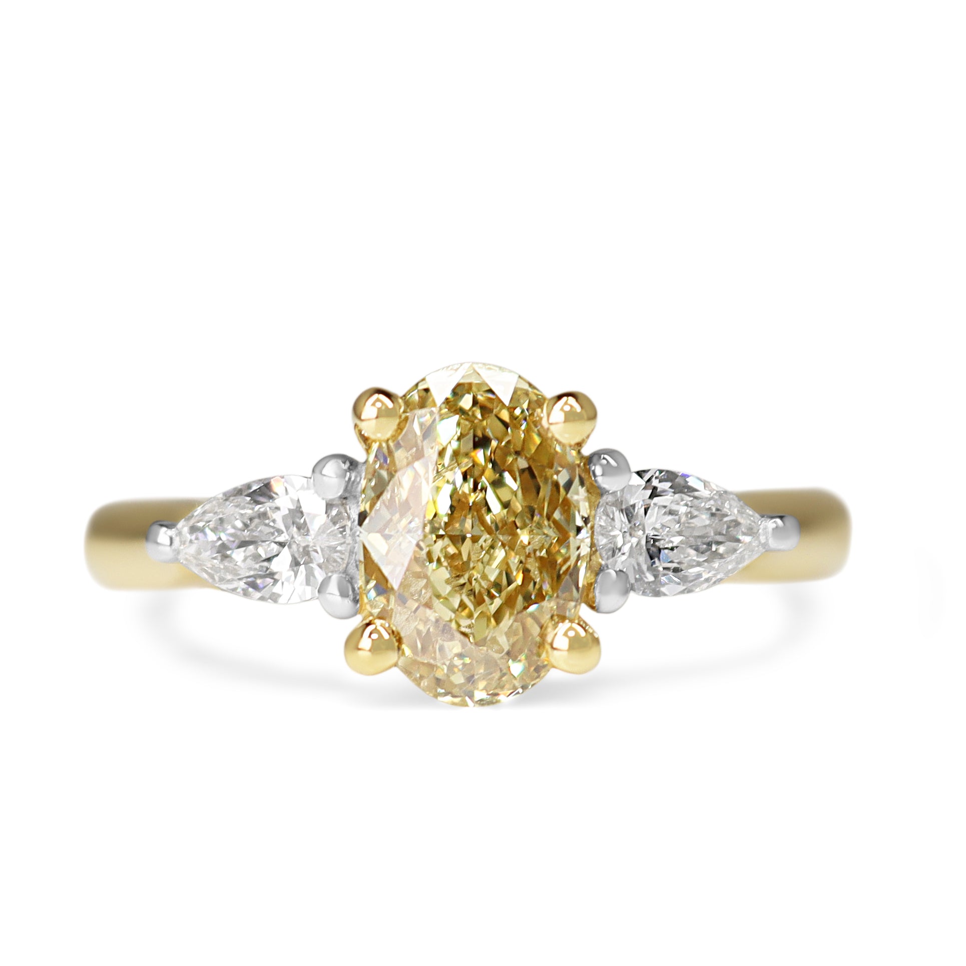 18ct Yellow and White Gold Oval Yellow Diamond and White Pear Cut 3 Stone Ring