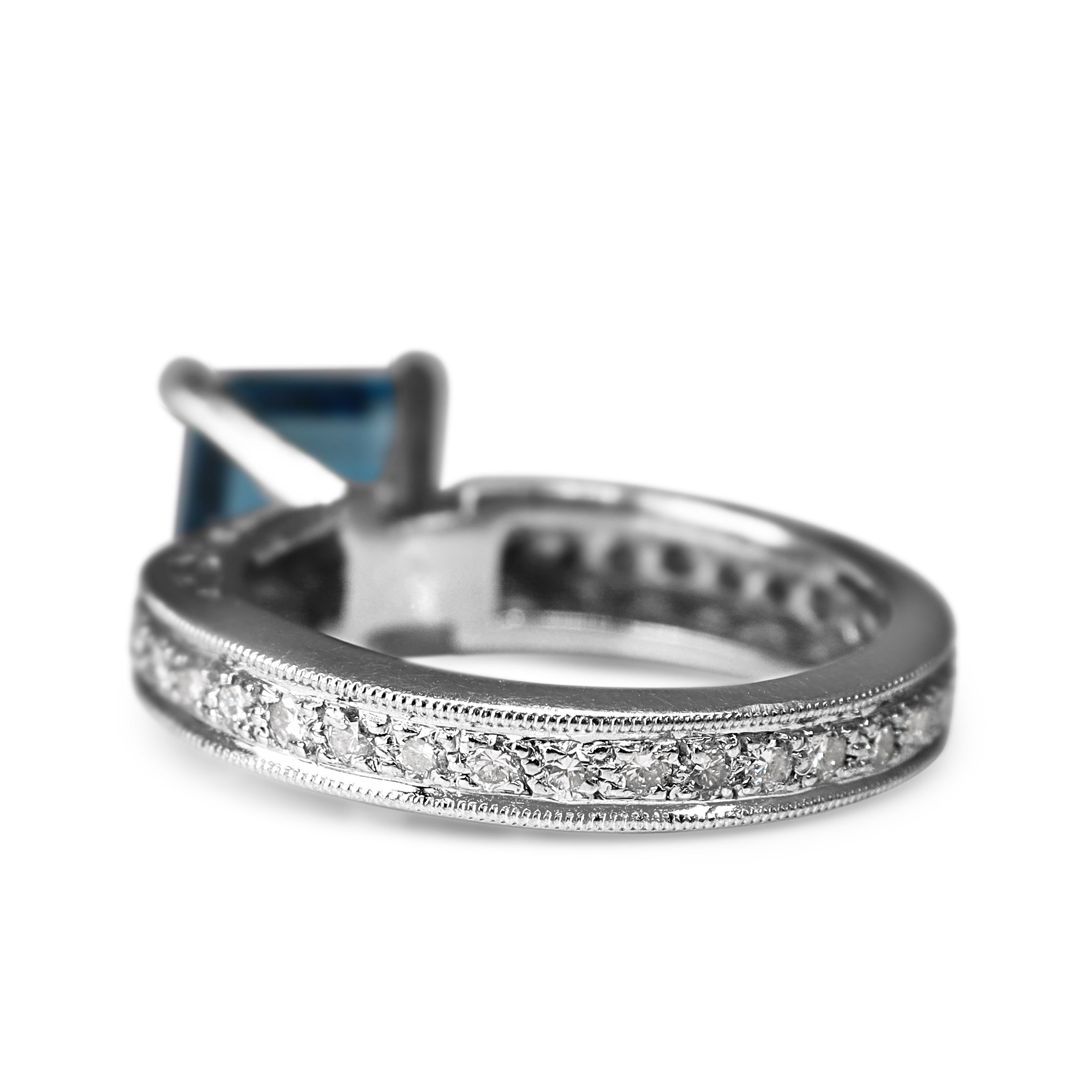 Platinum Blue Topaz and Diamond Solitaire Ring with Filigree
