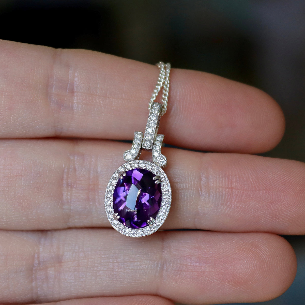 18ct White Gold Cabochon Amethyst and Diamond Halo Pendant