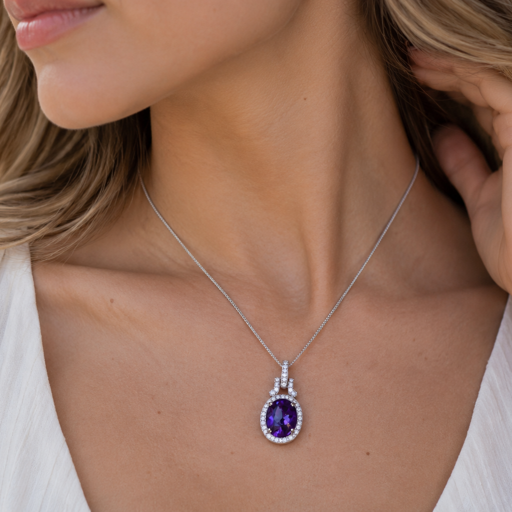 18ct White Gold Cabochon Amethyst and Diamond Halo Pendant