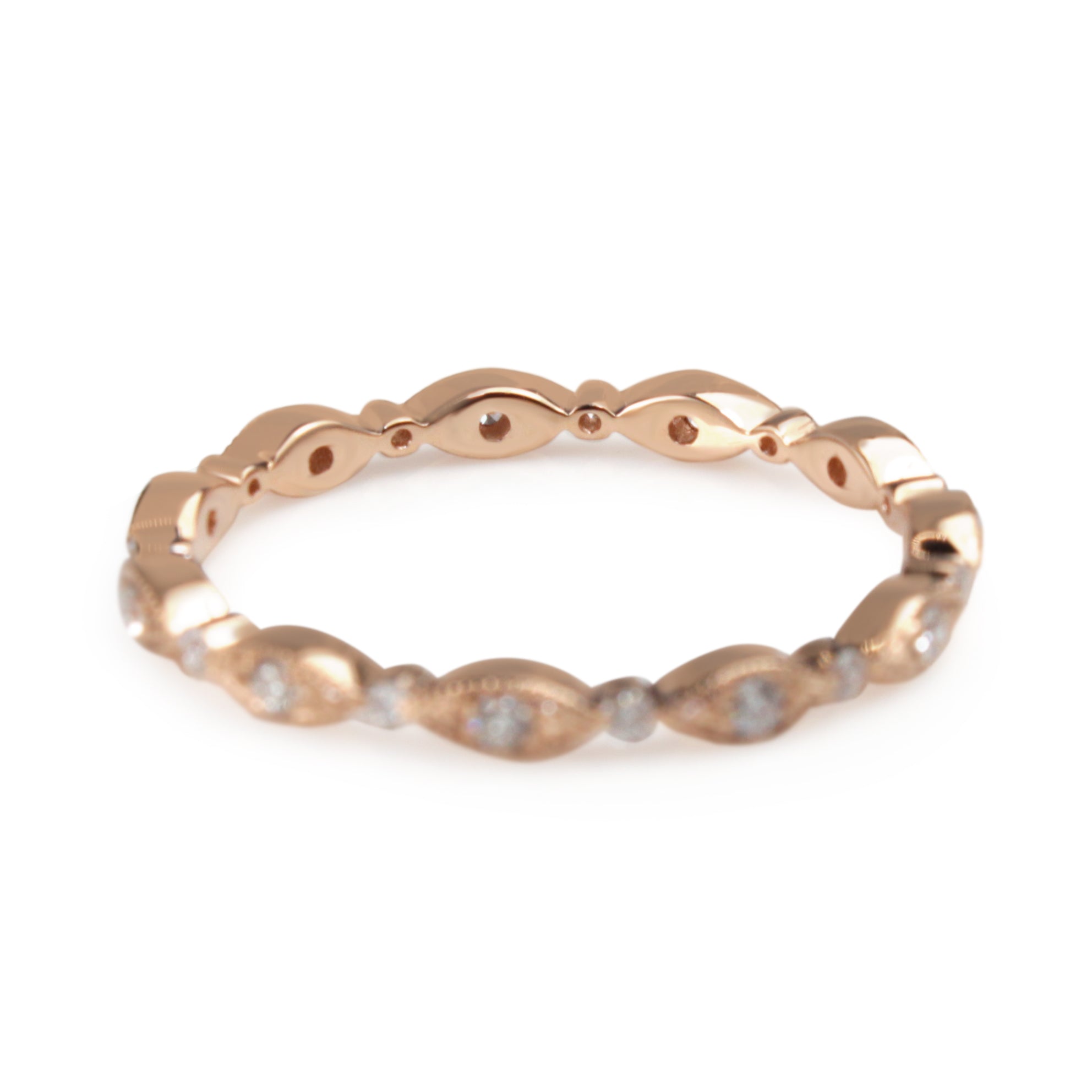 Profile view of the 18ct rose gold all round diamond band