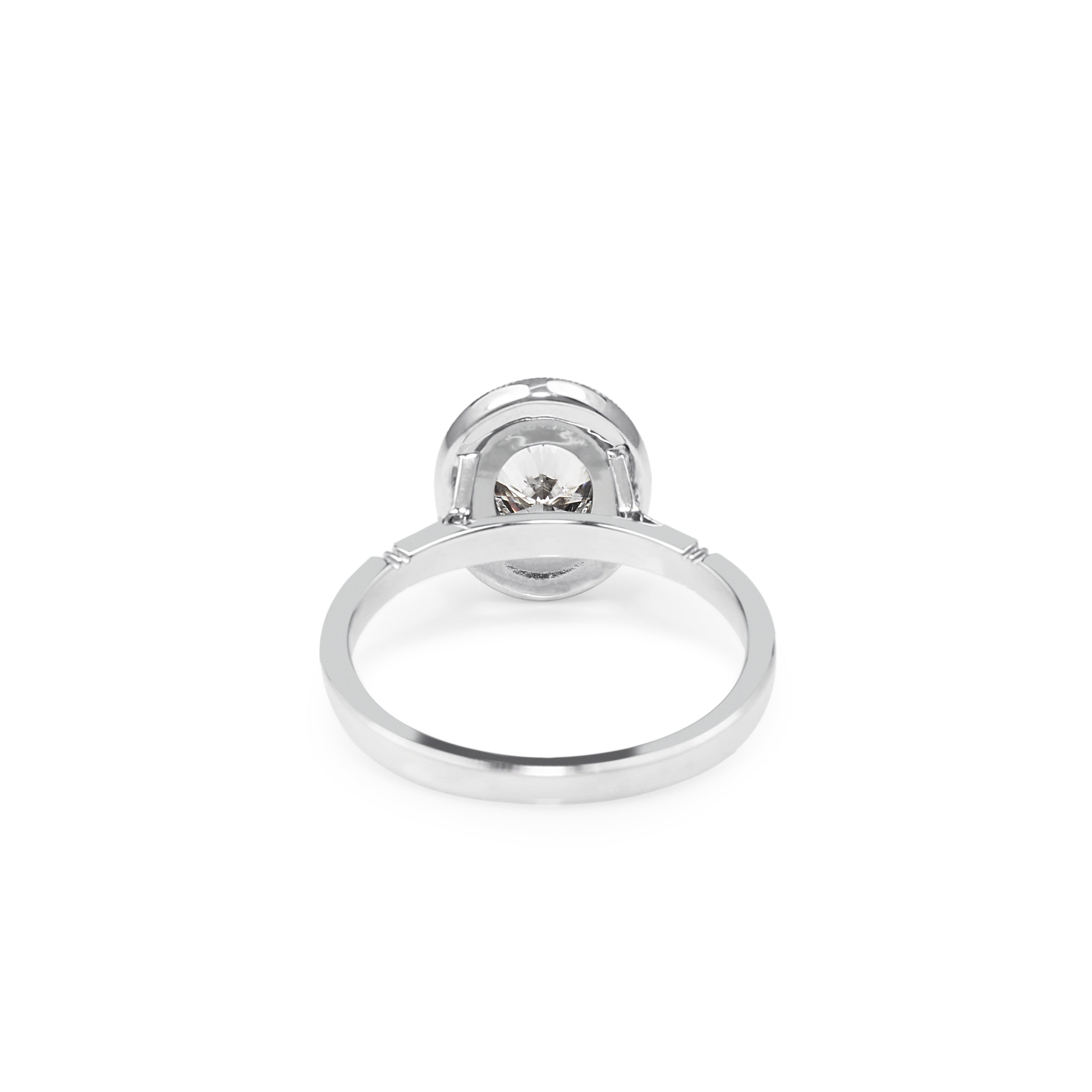 Oval Bezel Halo Diamond Ring