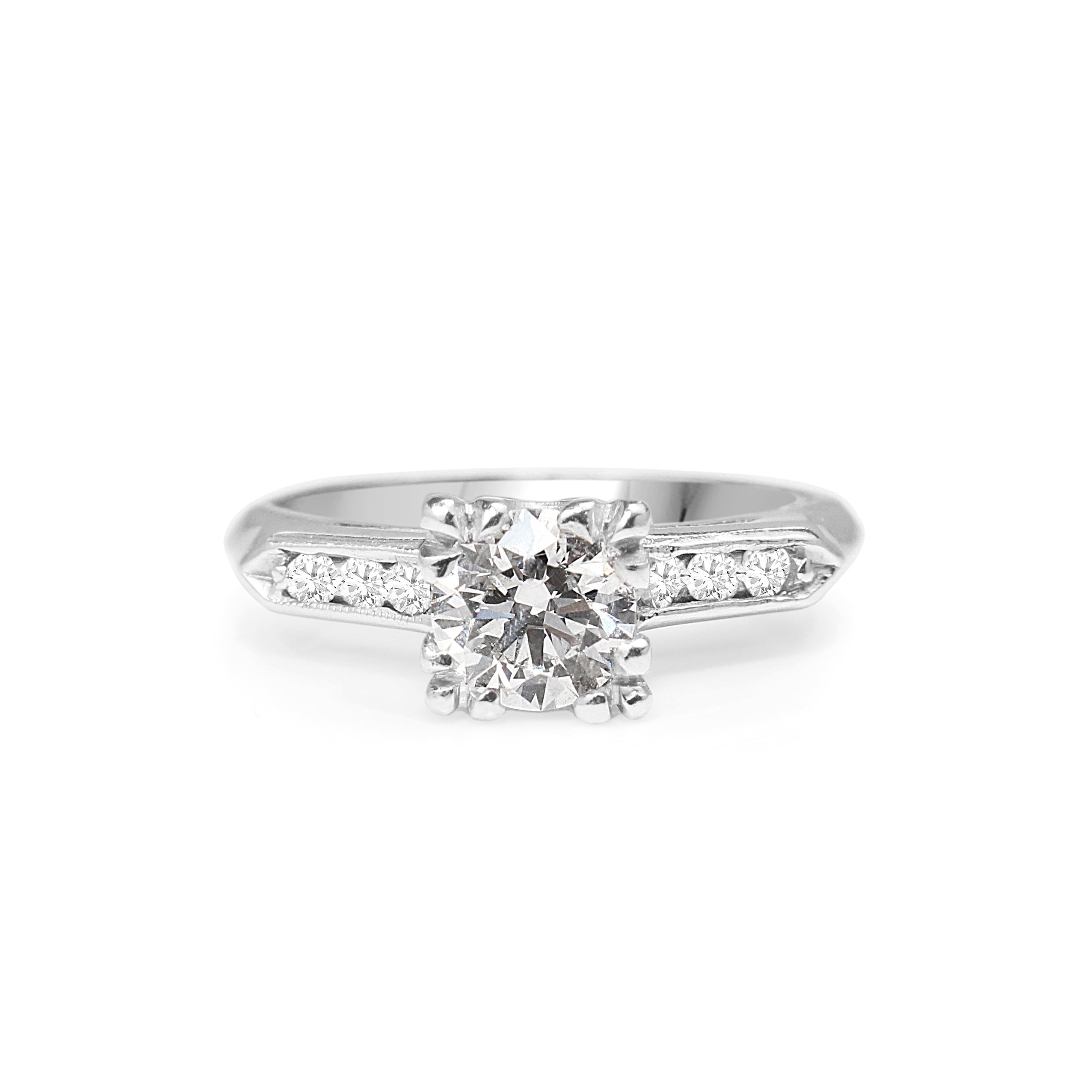 Platinum vintage diamond engagement ring on hand