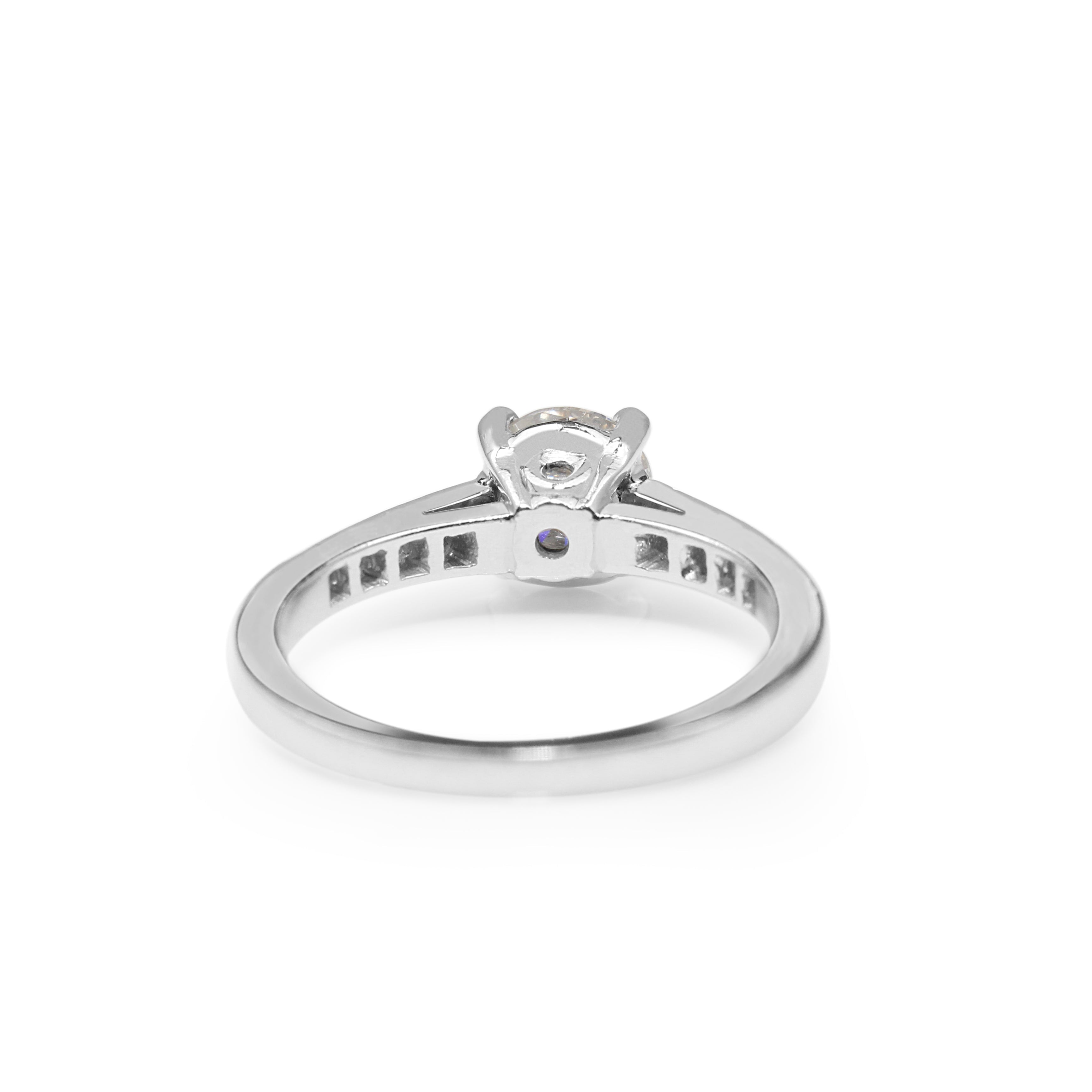 High‑resolution close‑up of platinum diamond solitaire ring facets