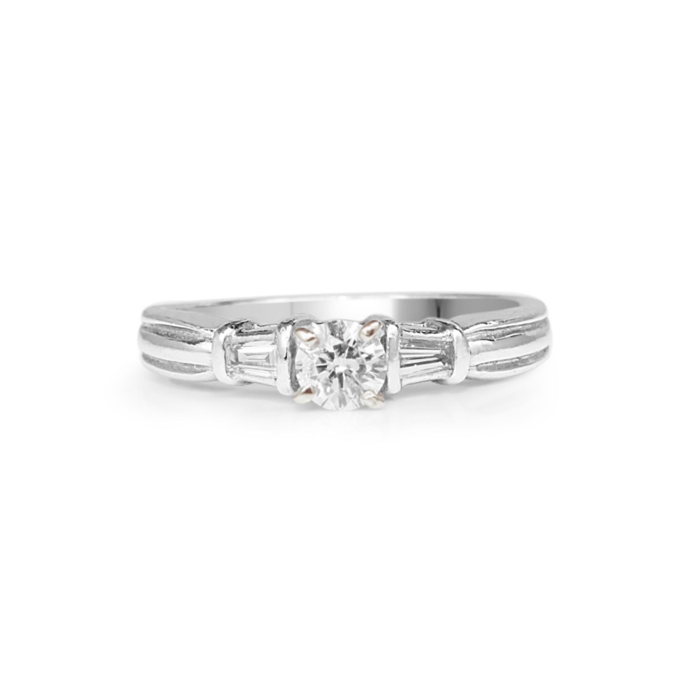 Platinum vintage diamond solitaire engagement ring on white background – classic Art Deco design