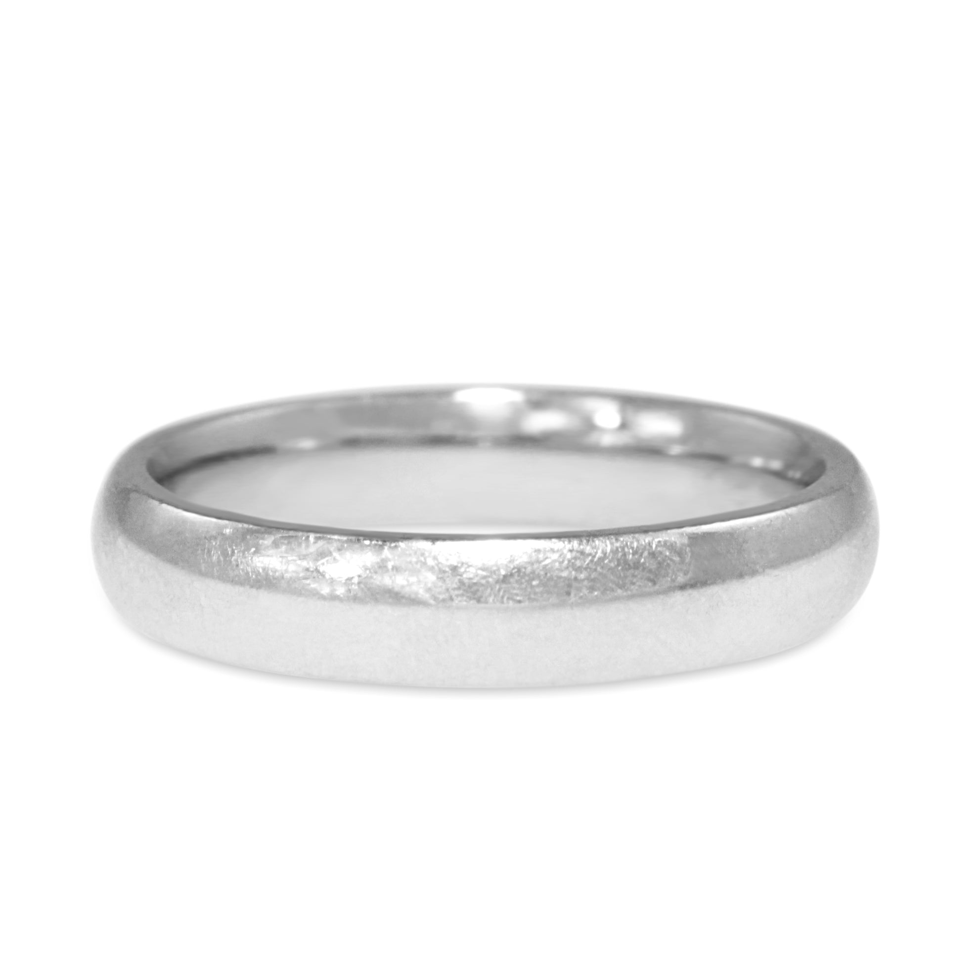 Close-up detail of platinum 3.9mm wedding band