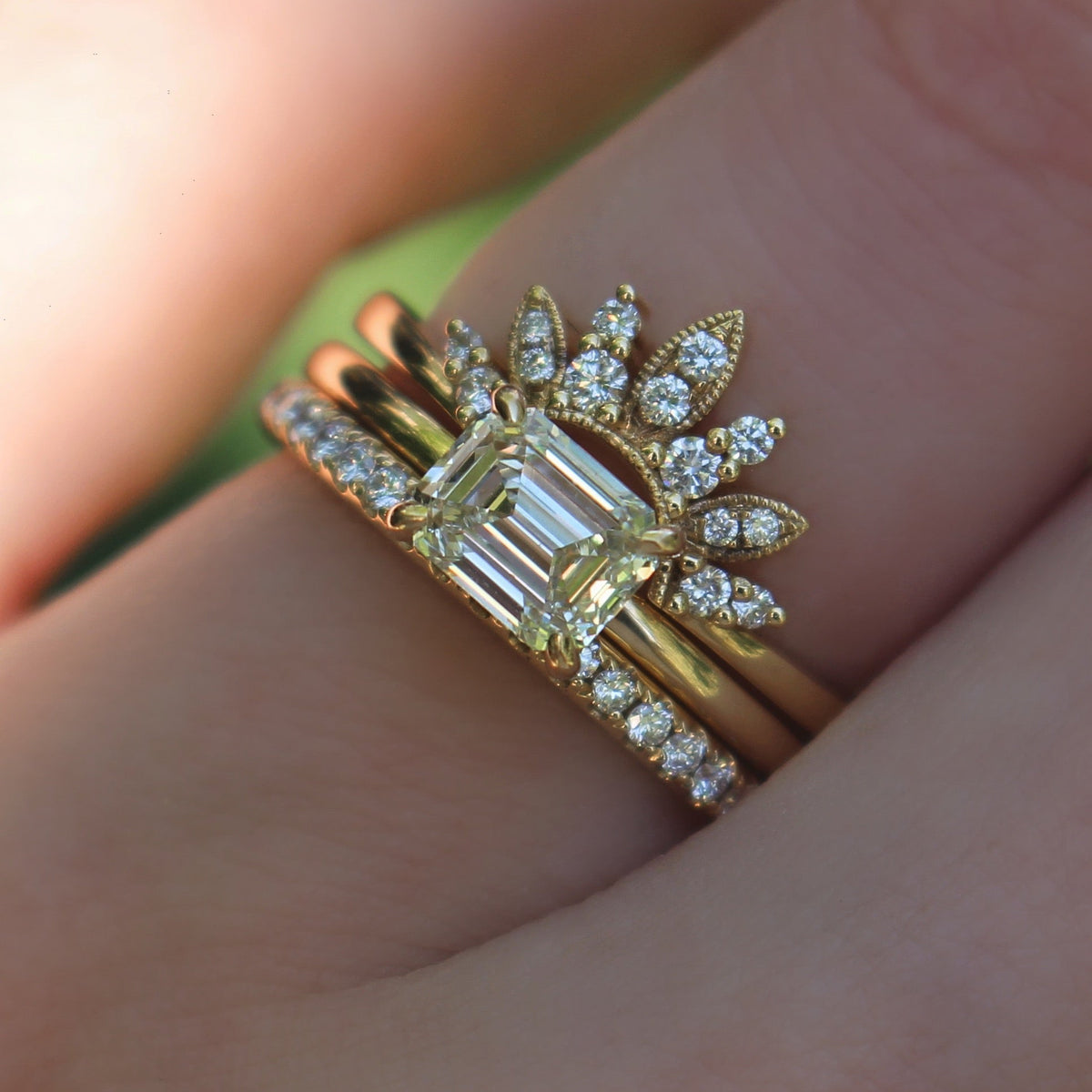 Yellow gold diamond band worn in a stacked ring combination