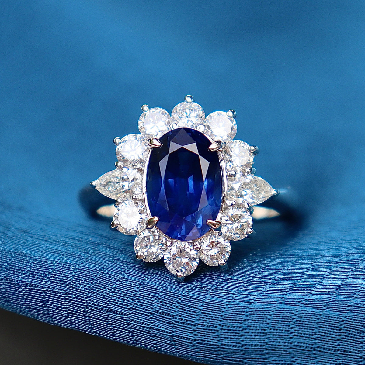 Platinum Oval Sapphire & Diamond Halo Cluster Ring