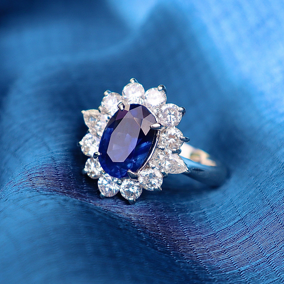 Platinum Oval Sapphire & Diamond Halo Cluster Ring