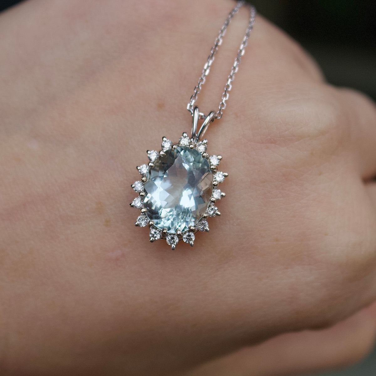 14ct White Gold Aquamarine and Diamond Halo Pendant