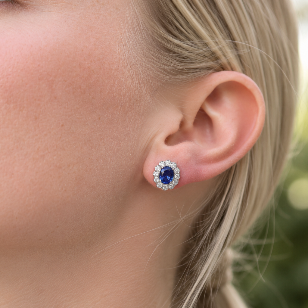 Platinum Oval Sapphire and Diamond Daisy Halo Earrings
