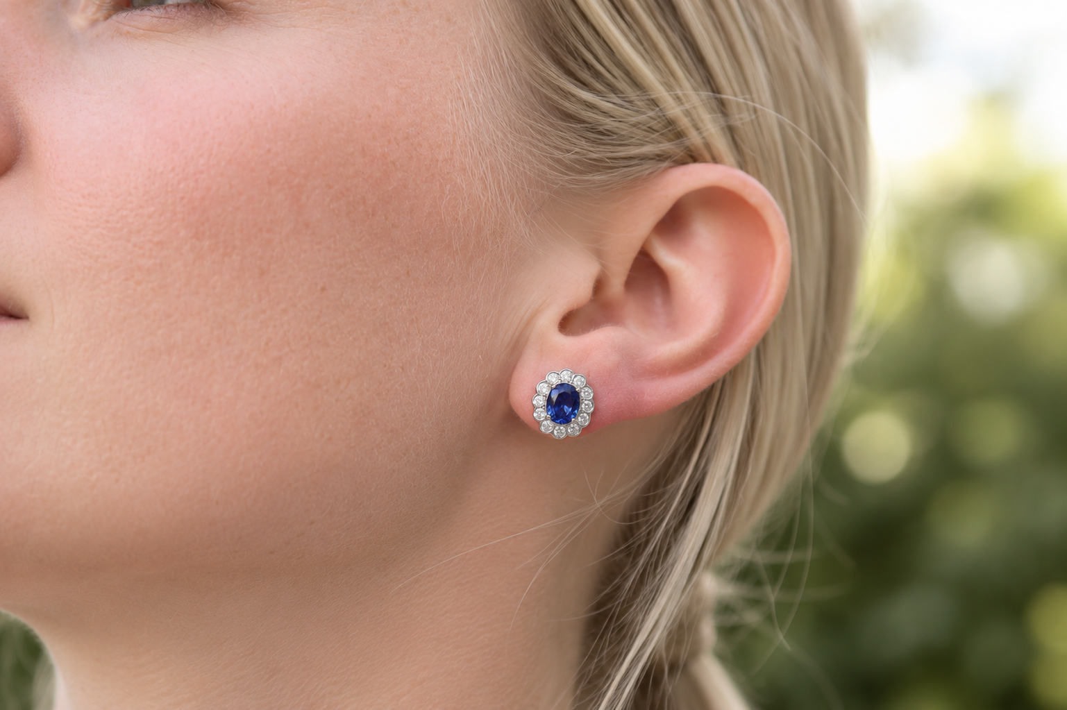 Platinum Oval Sapphire and Diamond Daisy Halo Earrings