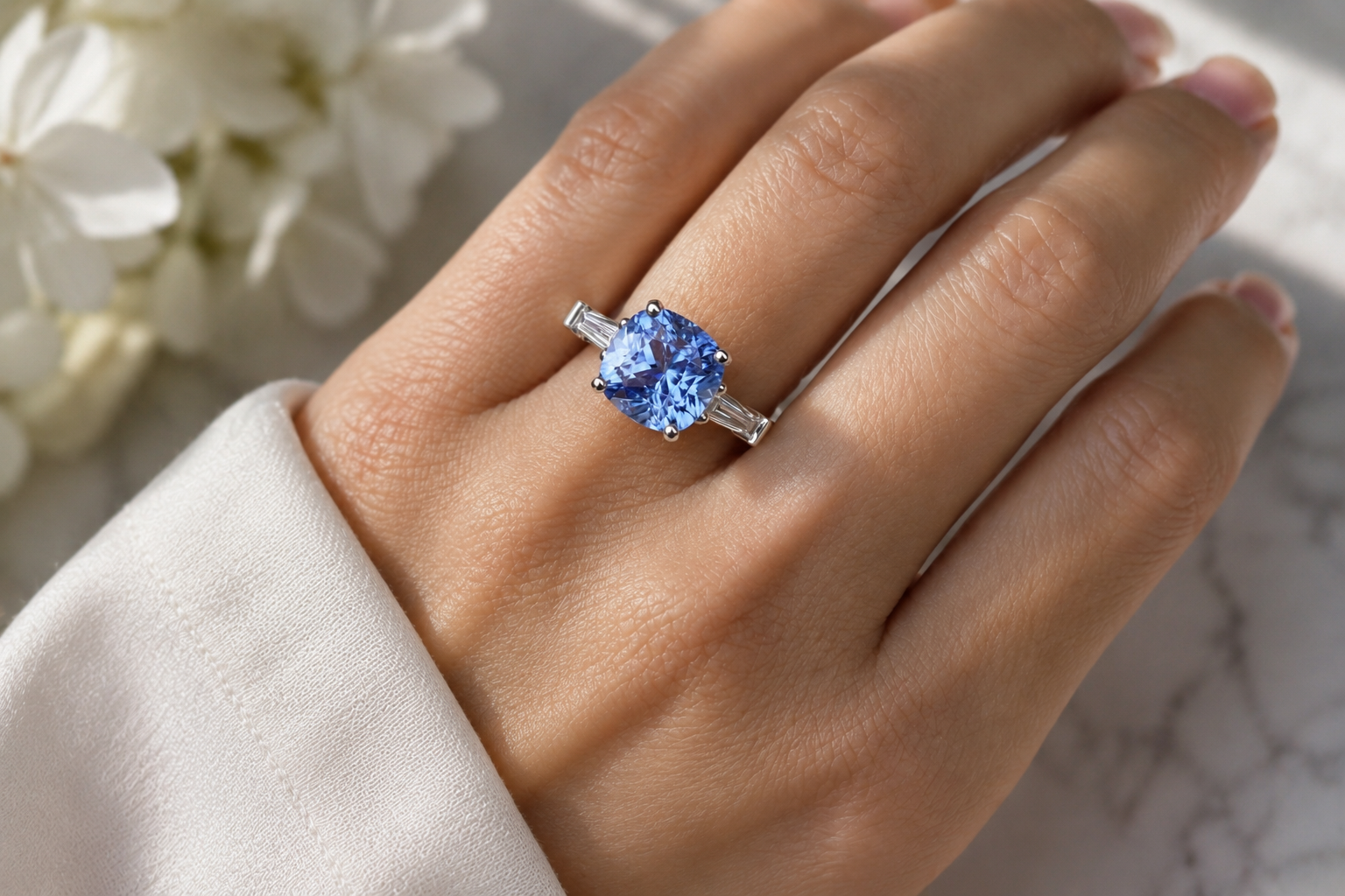 Platinum 5.26ct Cushion Sapphire and Tapered Baguette Diamond 3 Stone Ring