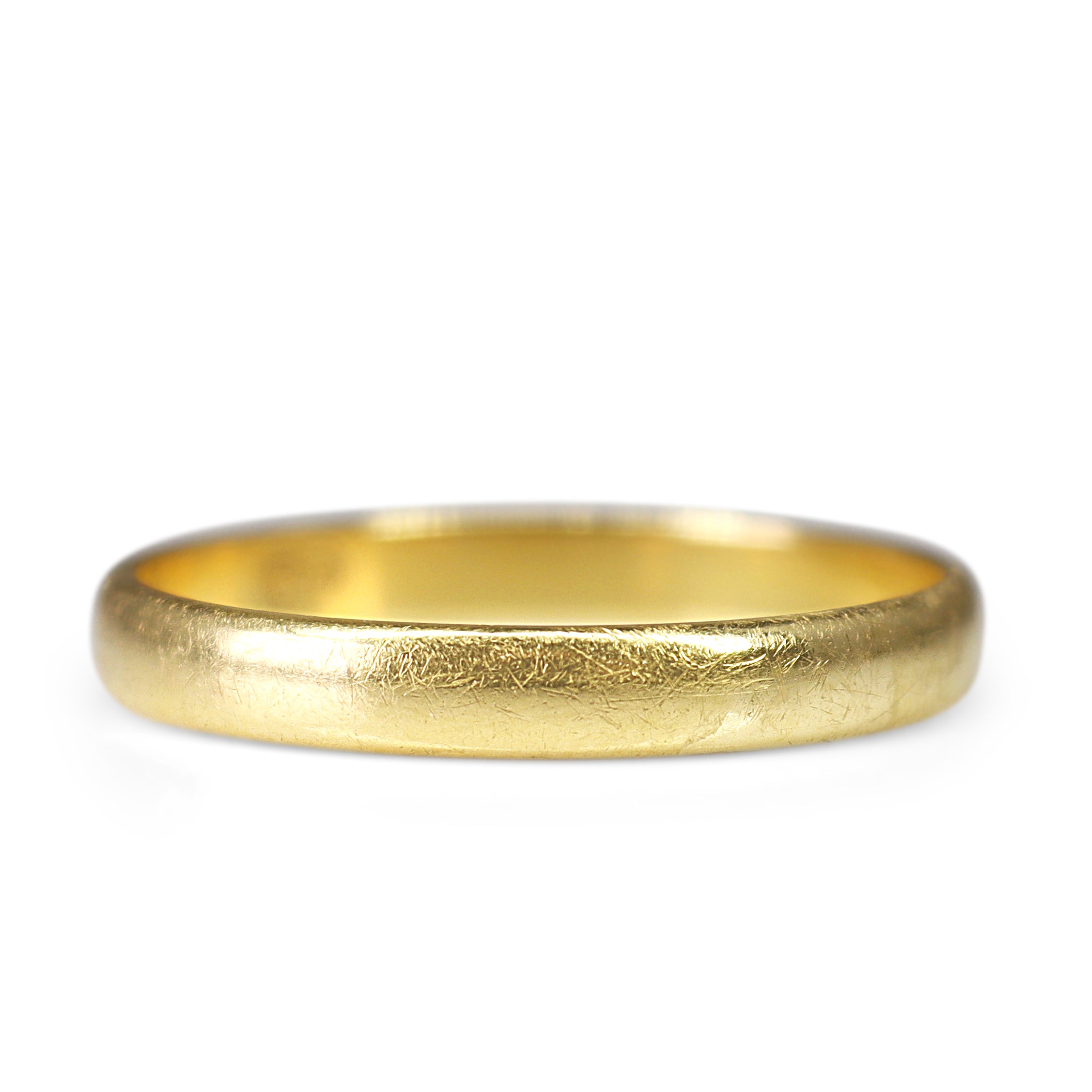 Elegant 9ct yellow gold plain wedding ring showcasing a polished gold finish