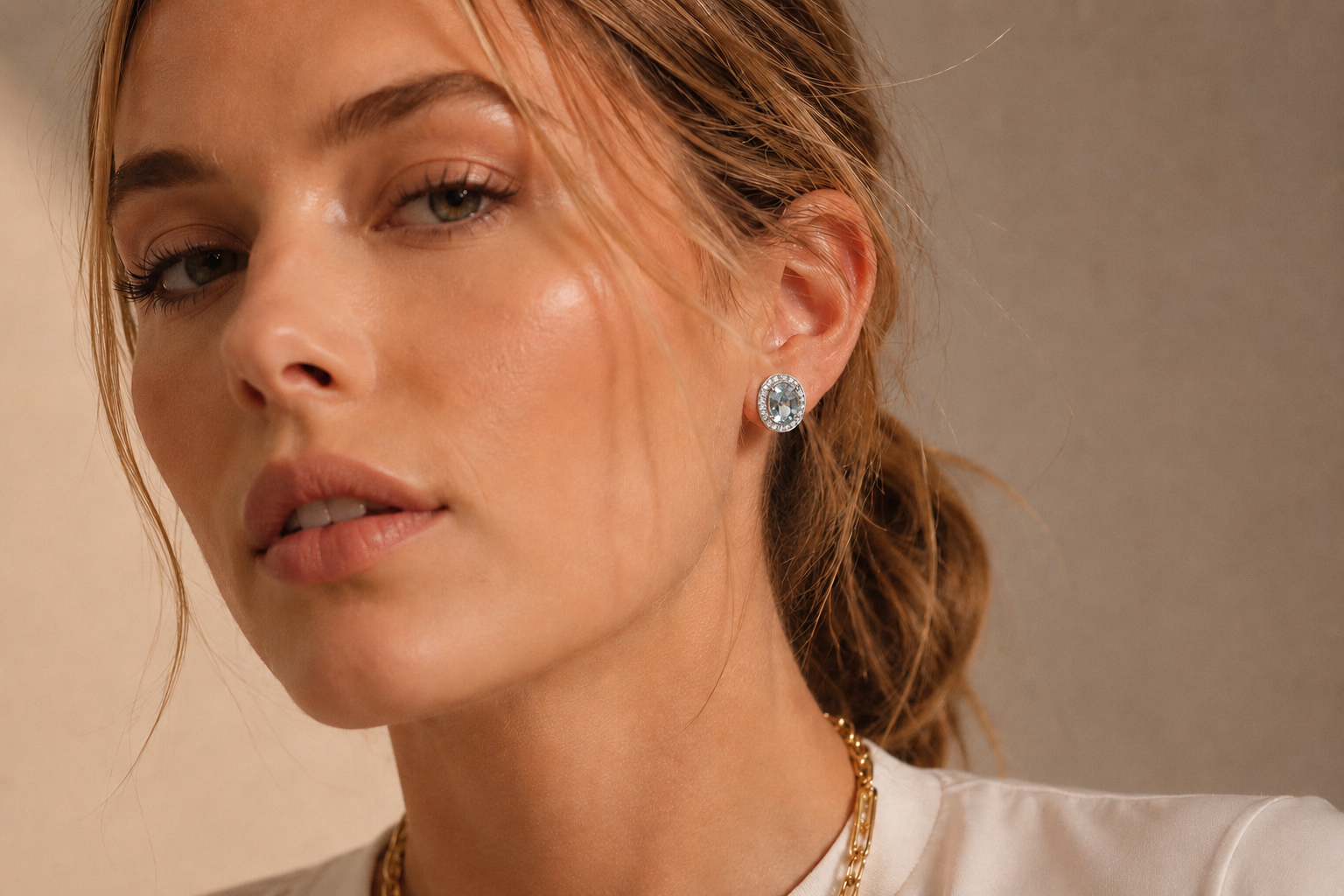 18ct White Gold Oval Aquamarine and Diamond Halo Stud Earrings