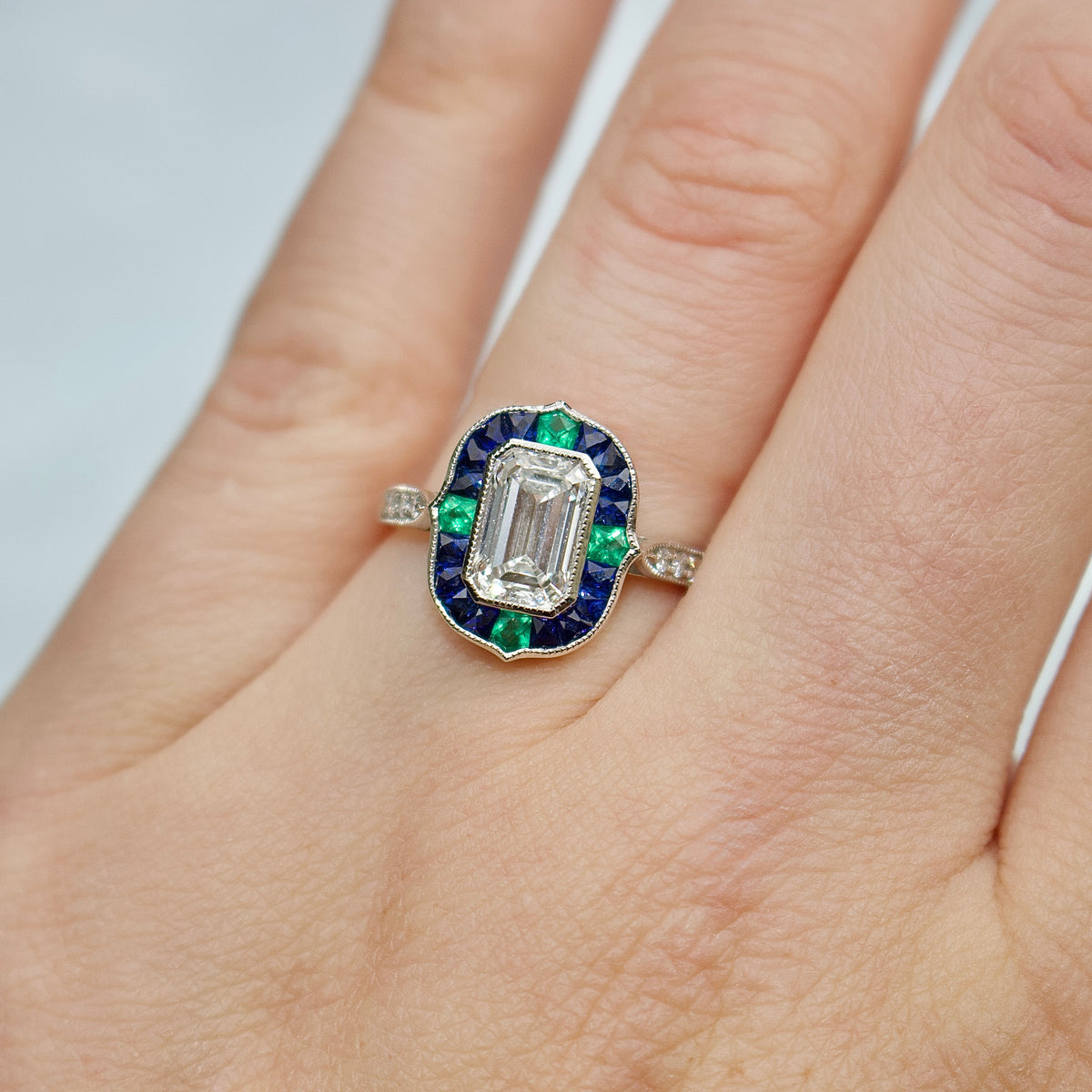 Platinum Lab Grown Emerald Cut Diamond and Sapphire and Emerald Art Deco Style Halo Ring