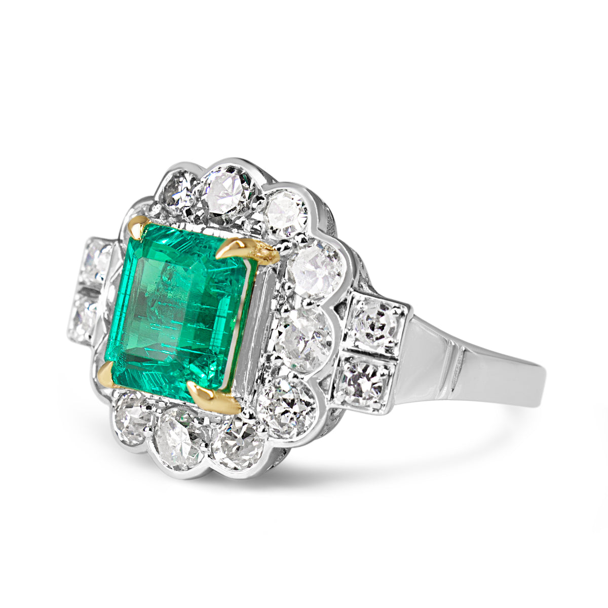 18ct White Gold Emerald and Old Cut Diamond Daisy Style Halo Ring