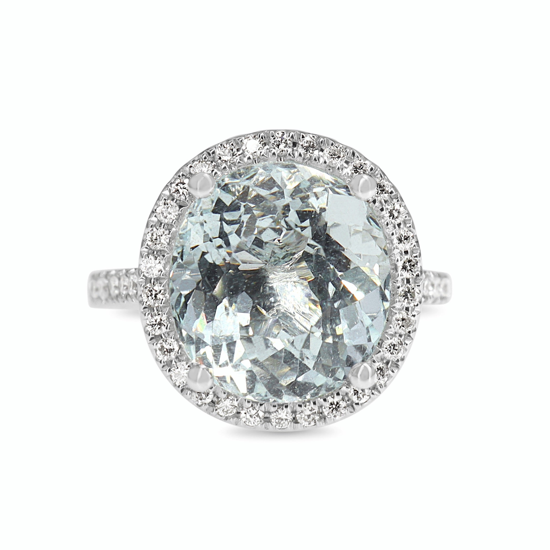 18ct White Gold Aquamarine and DIamond Halo Ring