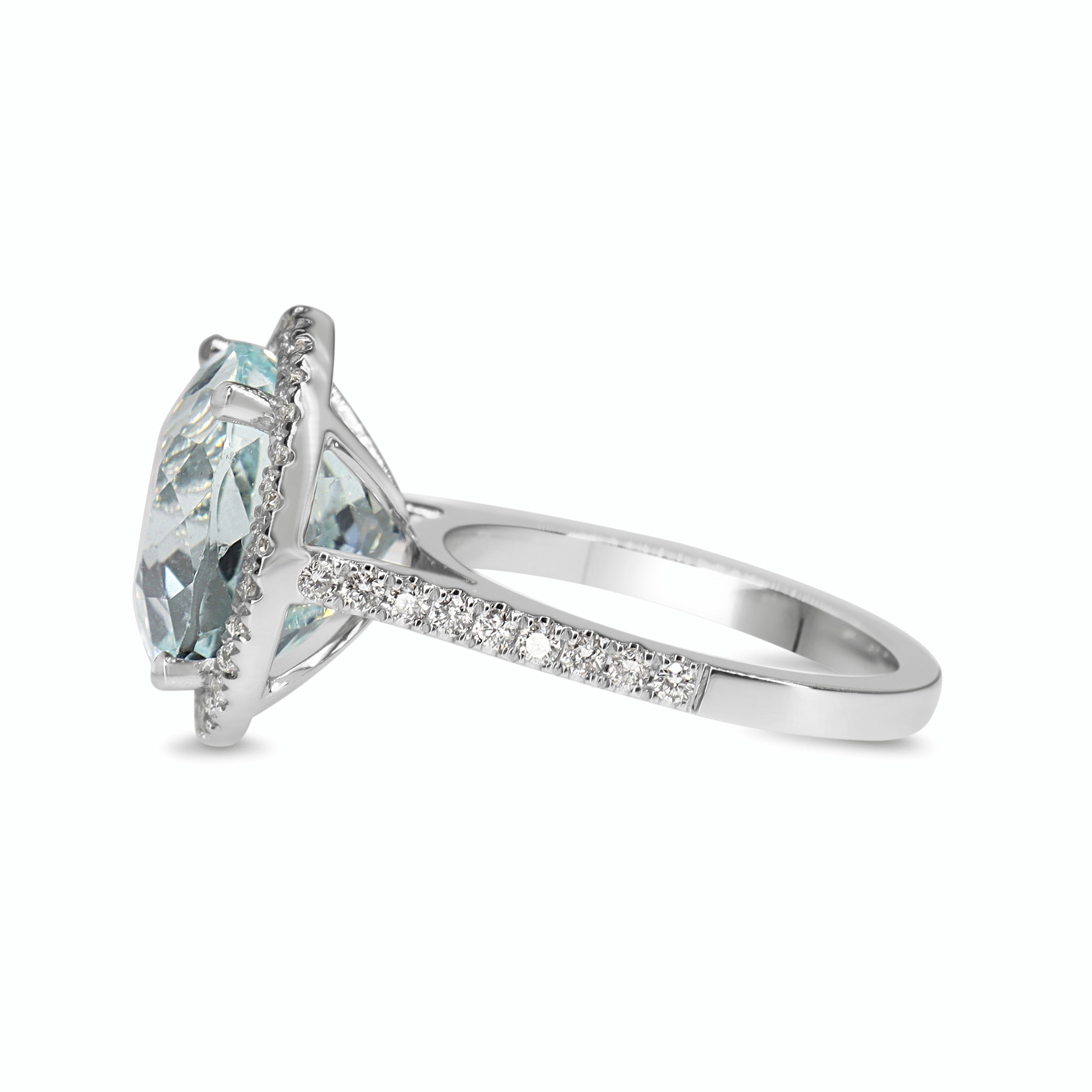 18ct White Gold Aquamarine and DIamond Halo Ring